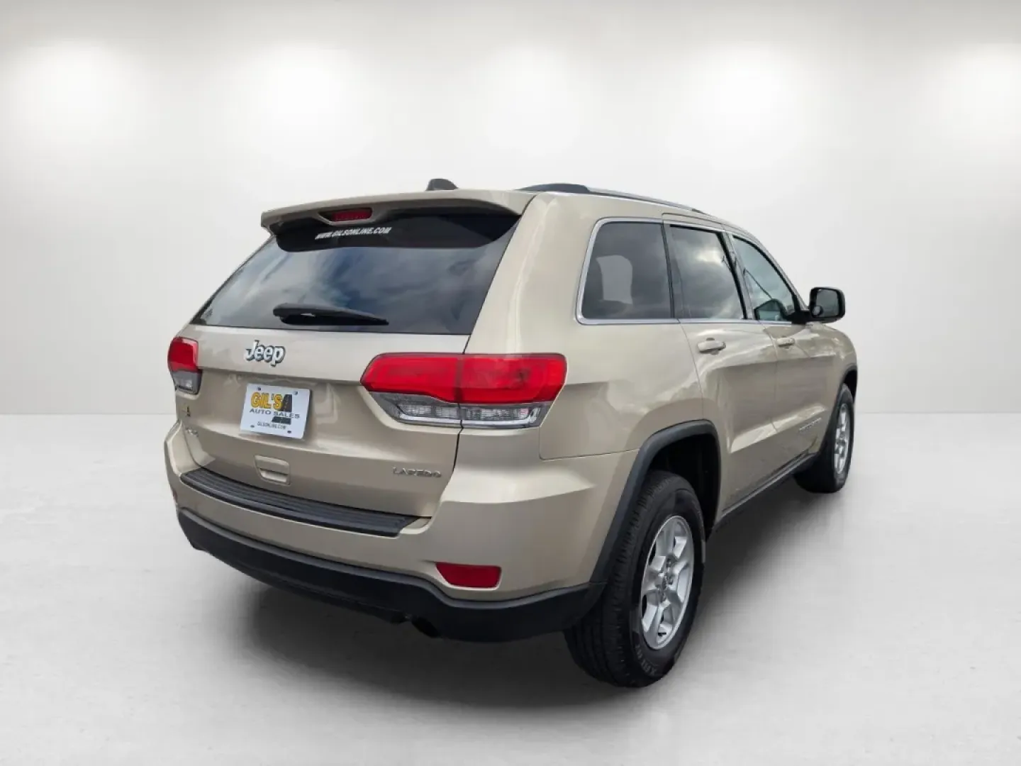 2014 /Black/Lt Frost Beige Jeep Grand Cherokee Laredo (1C4RJFAG8EC) with an Other engine, located at 3959 U.S. 80 W, Phenix City, AL, 36870, (334) 297-4885, 32.469296, -85.135185 - **Discover Adventure with the 2014 Jeep Grand Cherokee at Gils Auto in Phenix City, AL!**<br /> <br /> Are you ready to elevate your outdoor adventures or enhance your daily commute? Look no further than the 2014 Jeep Grand Cherokee Laredo, a versatile SUV that is perfect for both weekend getaways a - Photo#5
