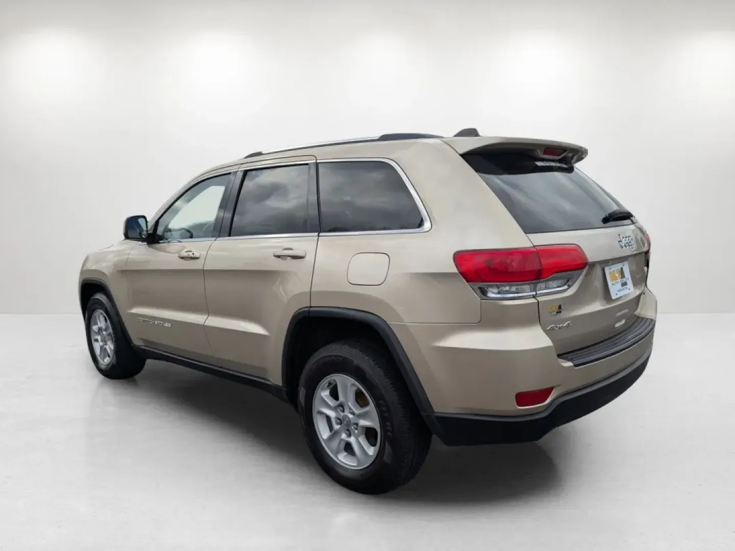 2014 /Black/Lt Frost Beige Jeep Grand Cherokee Laredo (1C4RJFAG8EC) with an Other engine, located at 3959 U.S. 80 W, Phenix City, AL, 36870, (334) 297-4885, 32.469296, -85.135185 - **Discover Adventure with the 2014 Jeep Grand Cherokee at Gils Auto in Phenix City, AL!**<br /> <br /> Are you ready to elevate your outdoor adventures or enhance your daily commute? Look no further than the 2014 Jeep Grand Cherokee Laredo, a versatile SUV that is perfect for both weekend getaways a - Photo#7