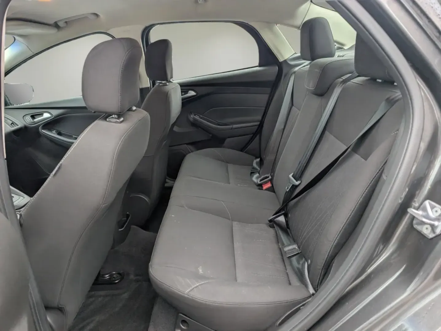 2015 Ford Focus SE (1FADP3F23FL) with an Other engine, located at 804 22nd Ave, Phenix City, AL, 36870, (334) 297-1860, 32.484749, -85.024475 - **Your Perfect Daily Companion: 2015 Ford Focus SE at Gils Auto in Phenix City, AL**<br /> <br /> Are you searching for a fuel-efficient sedan that effortlessly balances comfort and style? Look no further than this 2015 Ford Focus SE, a versatile vehicle that's perfect for daily commutes, family out - Photo#10