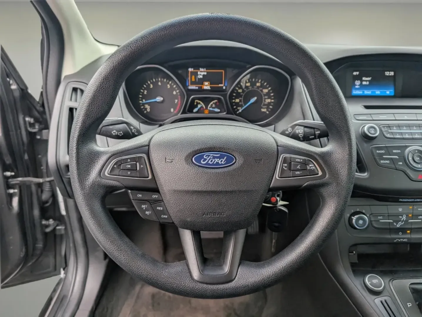 2015 Ford Focus SE (1FADP3F23FL) with an Other engine, located at 804 22nd Ave, Phenix City, AL, 36870, (334) 297-1860, 32.484749, -85.024475 - **Your Perfect Daily Companion: 2015 Ford Focus SE at Gils Auto in Phenix City, AL**<br /> <br /> Are you searching for a fuel-efficient sedan that effortlessly balances comfort and style? Look no further than this 2015 Ford Focus SE, a versatile vehicle that's perfect for daily commutes, family out - Photo#14
