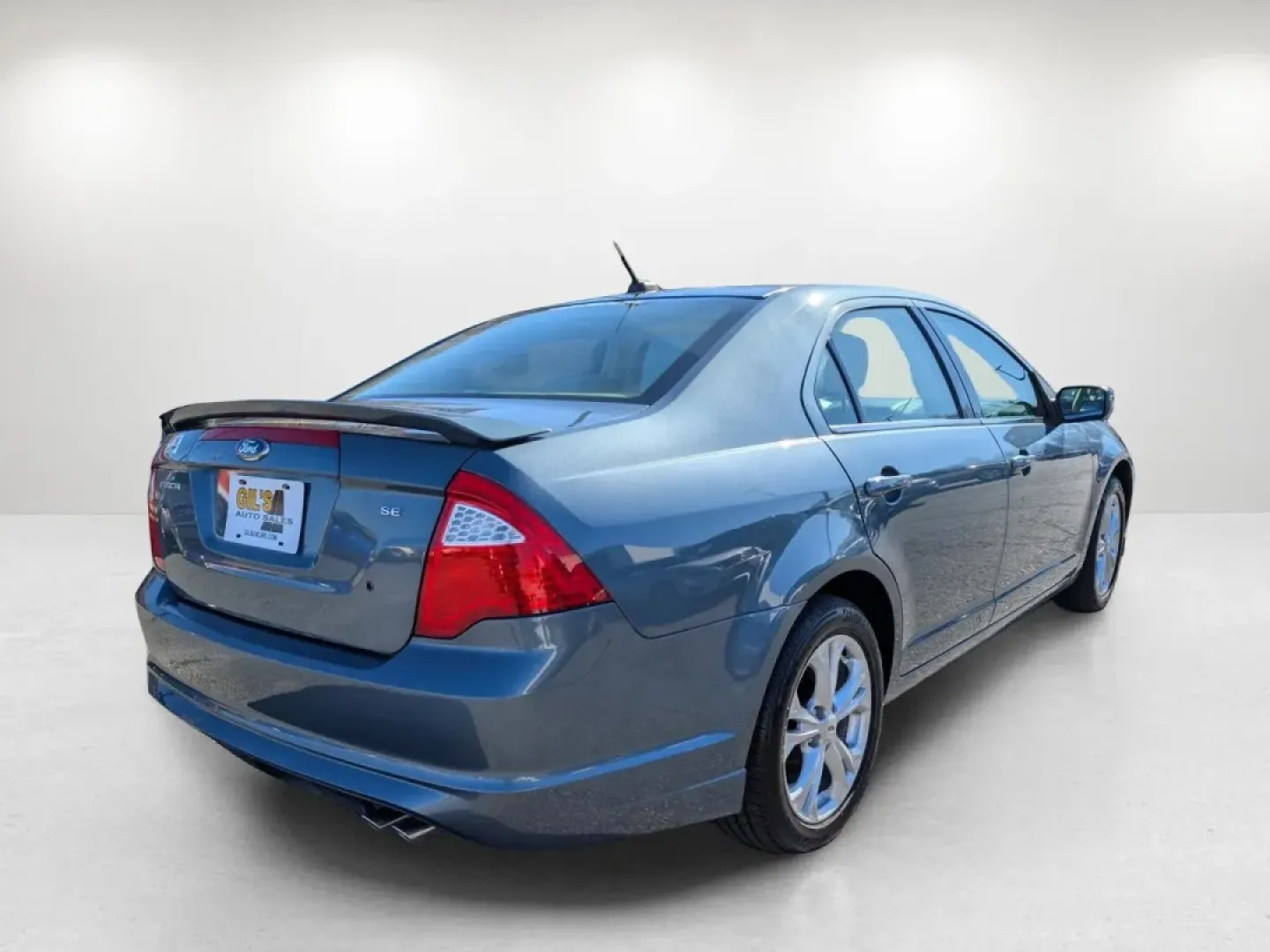 2012 Ford Fusion SE (3FAHP0HA3CR) with an Other engine, located at 804 22nd Ave, Phenix City, AL, 36870, (334) 297-1860, 32.484749, -85.024475 - **Explore Life on the Road with the 2012 Ford Fusion SE Perfect for Your Next Adventure!**<br /> <br /> If you're in the market for a dependable vehicle that seamlessly blends style, comfort, and practicality, look no further than the 2012 Ford Fusion SE available at Gils Auto in Phenix City, AL. T - Photo#4