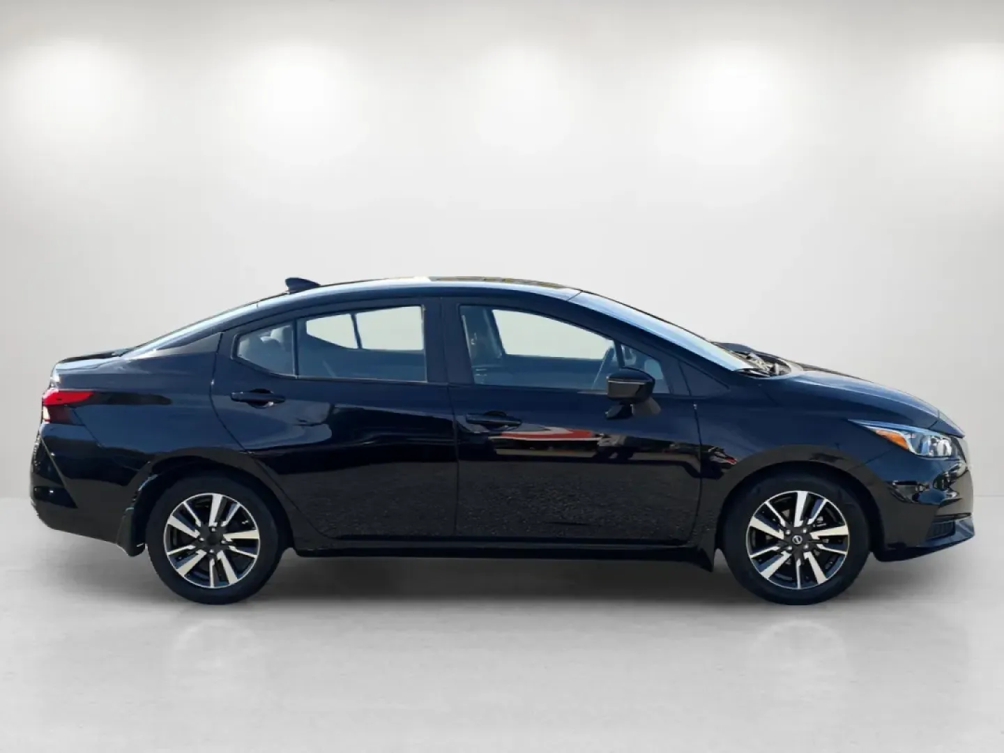 2020 /Black Nissan Versa SV (3N1CN8EV4LL) with an Other engine, located at 7000 Northlake Connector, Columbus, GA, 31904, (706) 987-8085, 32.524975, -84.978134 - **Discover the 2020 Nissan Versa SV: Your Ideal Commuter Companion from Gils Auto in Phenix City, AL!**<br /> <br /> Are you on the lookout for a reliable sedan that seamlessly fits into your busy lifestyle? Look no further! The 2020 Nissan Versa SV is perfect for long commutes or weekend getaways, - Photo#3