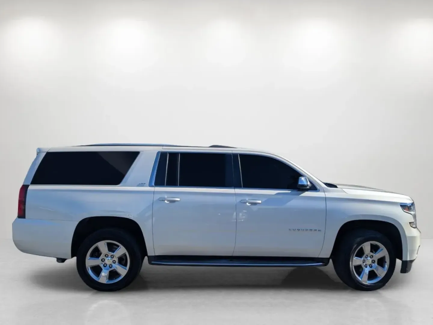 2015 /Cocoa/Dune Chevrolet Suburban LTZ (1GNSCKKC6FR) with an Other engine, located at 3959 U.S. 80 W, Phenix City, AL, 36870, (334) 297-4885, 32.469296, -85.135185 - Discover a new dimension of family travel with this stunning **2015 Chevrolet Suburban LTZ**, available now at **Gils Auto** in beautiful **Phenix City, AL**. Designed for those who prioritize space, comfort, and technology, this SUV is perfect for growing families, weekend adventurers, or anyone wh - Photo#4
