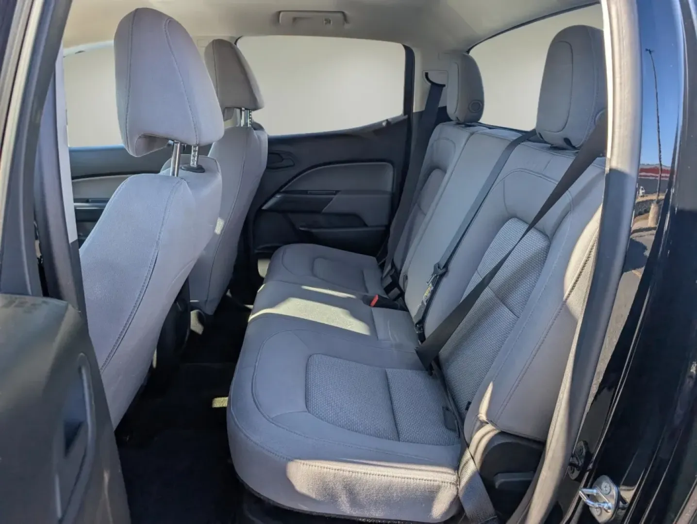 2017 /Jet Black/Dark Ash GMC Canyon 2WD (1GTG5BEA6H1) with an Other engine, located at 3959 U.S. 80 W, Phenix City, AL, 36870, (334) 297-4885, 32.469296, -85.135185 - **Discover the Perfect Blend of Style and Utility with the 2017 GMC Canyon at Gils Auto in Phenix City, AL!**<br /> <br /> Are you in the market for a versatile pickup that fits seamlessly into your lifestyle? Whether you're a growing family needing space for weekend adventures, a commuter seeking a - Photo#10