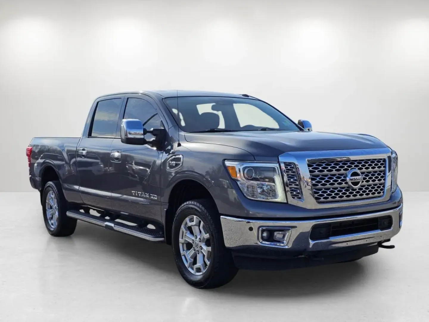 2017 /Black Nissan Titan XD SL (1N6AA1F43HN) with an Other engine, located at 7000 Northlake Connector, Columbus, GA, 31904, (706) 987-8085, 32.524975, -84.978134 - **Adventure Awaits with the 2017 Nissan Titan XD Crew Cab SL Your Perfect Partner for Work and Play!**<br /> <br /> If you're looking for a vehicle that can handle your active lifestyle while providing comfort and style, look no further than the 2017 Nissan Titan XD Crew Cab SL. This rugged yet ref - Photo#2