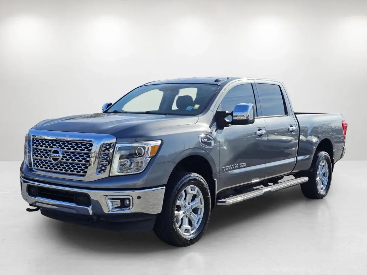 2017 /Black Nissan Titan XD SL (1N6AA1F43HN) with an Other engine, located at 3959 U.S. 80 W, Phenix City, AL, 36870, (334) 297-4885, 32.469296, -85.135185 - **Adventure Awaits with the 2017 Nissan Titan XD Crew Cab SL Your Perfect Partner for Work and Play!**<br /> <br /> If you're looking for a vehicle that can handle your active lifestyle while providing comfort and style, look no further than the 2017 Nissan Titan XD Crew Cab SL. This rugged yet ref - Photo#1