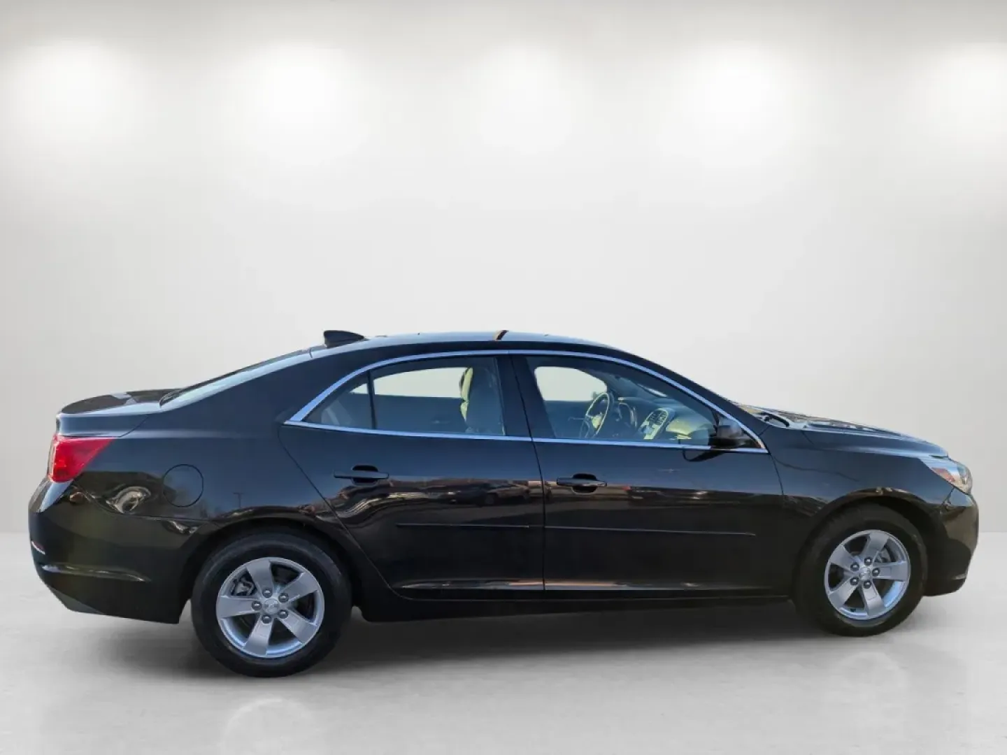 2015 /Jet Black/Titanium Chevrolet Malibu LS (1G11B5SL7FF) with an Other engine, located at 1430 Gateway Drive, Opelika, AL, 36801, (334) 239-0944, 32.637871, -85.409790 - **Elevate Your Daily Commute with the 2015 Chevrolet Malibu LS!** <br /> <br /> Are you looking for a reliable sedan that effortlessly combines comfort, style, and efficiency? Look no further than this stunning **2015 Chevrolet Malibu LS** available now at **Gils Auto** in Phenix City, AL. Perfectly - Photo#3