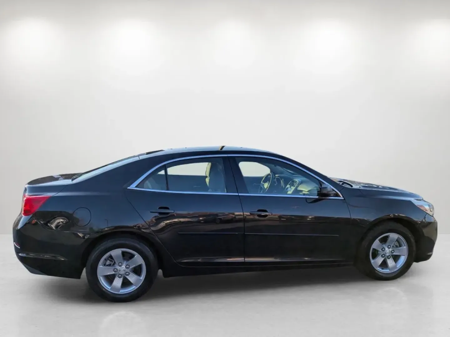 2015 /Jet Black/Titanium Chevrolet Malibu LS (1G11B5SL7FF) with an Other engine, located at 1430 Gateway Drive, Opelika, AL, 36801, (334) 239-0944, 32.637871, -85.409790 - **Elevate Your Daily Commute with the 2015 Chevrolet Malibu LS!** <br /> <br /> Are you looking for a reliable sedan that effortlessly combines comfort, style, and efficiency? Look no further than this stunning **2015 Chevrolet Malibu LS** available now at **Gils Auto** in Phenix City, AL. Perfectly - Photo#4