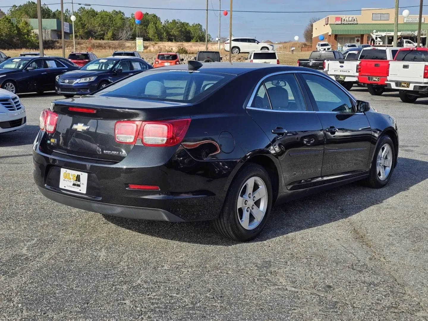 2015 /Jet Black/Titanium Chevrolet Malibu LS (1G11B5SL7FF) with an Other engine, located at 3959 U.S. 80 W, Phenix City, AL, 36870, (334) 297-4885, 32.469296, -85.135185 - 2015 Chevrolet Malibu LS - Photo#4
