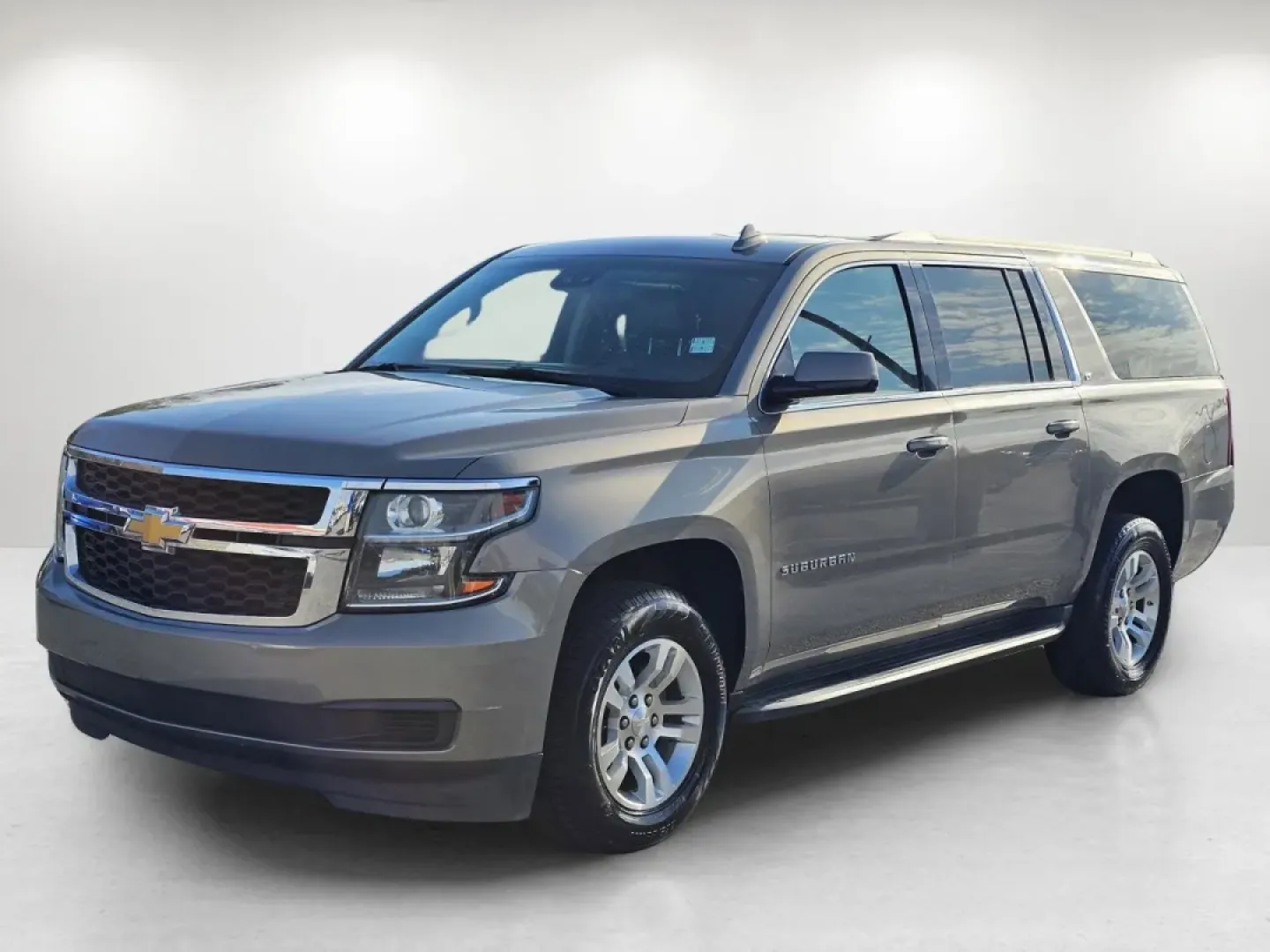 2019 /Cocoa/Dune Chevrolet Suburban LT (1GNSCHKCXKR) with an Other engine, located at 3959 U.S. 80 W, Phenix City, AL, 36870, (334) 297-4885, 32.469296, -85.135185 - **Unleash the Adventure in Your Life with the 2019 Chevrolet Suburban LT at Gils Auto in Phenix City, AL!**<br /> <br /> Are you ready to elevate your family adventures or weekend getaways? This 2019 Chevrolet Suburban LT offers the perfect blend of space, luxury, and rugged capability, making it an - Photo#1