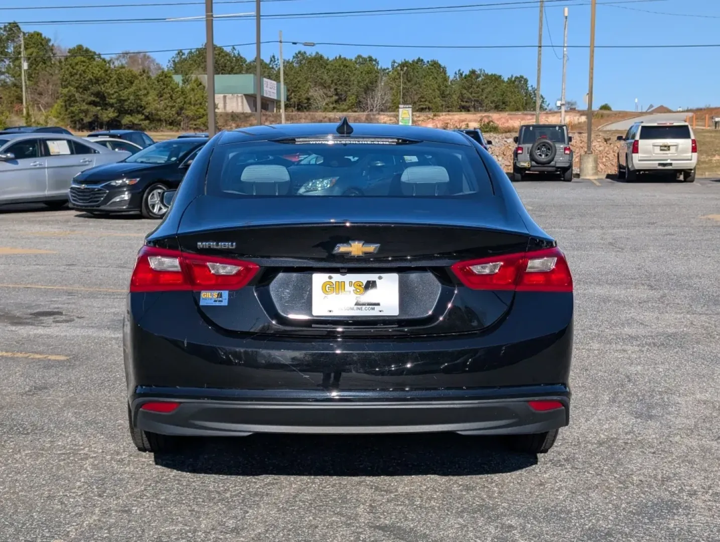 2022 /Dark Atmosphere/ Medium Ash Gray Chevrolet Malibu LS (1G1ZC5ST7NF) with an Other engine, located at 3959 U.S. 80 W, Phenix City, AL, 36870, (334) 297-4885, 32.469296, -85.135185 - **Discover the Perfect Balance of Style and Comfort with the 2022 Chevrolet Malibu at Gils Auto - Phenix City**<br /> <br /> Are you looking for a reliable sedan that effortlessly combines modern technology, spacious comfort, and fuel efficiency? Whether you're commuting to work, shuttling the kids - Photo#5