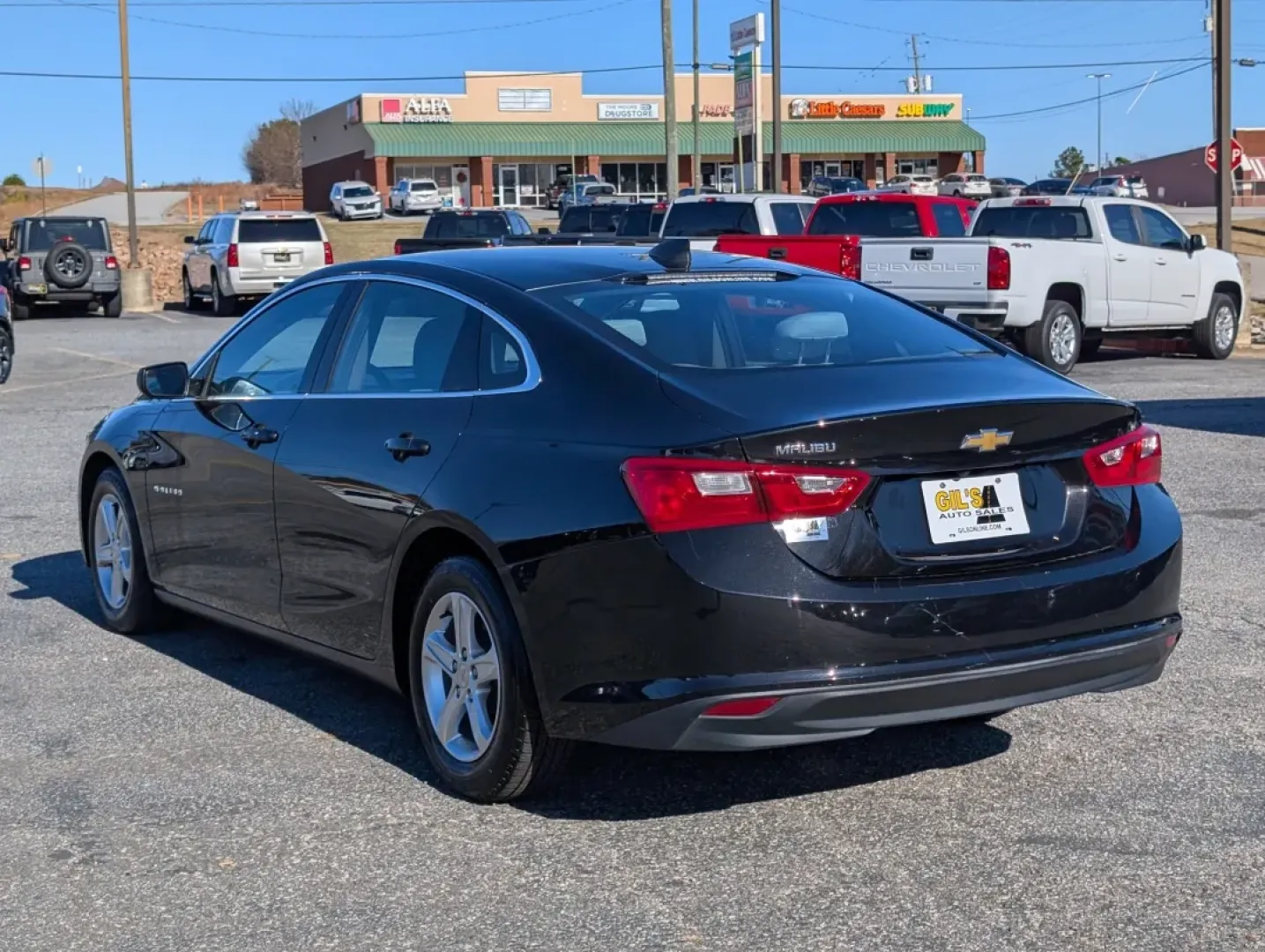 2022 /Dark Atmosphere/ Medium Ash Gray Chevrolet Malibu LS (1G1ZC5ST7NF) with an Other engine, located at 3959 U.S. 80 W, Phenix City, AL, 36870, (334) 297-4885, 32.469296, -85.135185 - **Discover the Perfect Balance of Style and Comfort with the 2022 Chevrolet Malibu at Gils Auto - Phenix City**<br /> <br /> Are you looking for a reliable sedan that effortlessly combines modern technology, spacious comfort, and fuel efficiency? Whether you're commuting to work, shuttling the kids - Photo#6