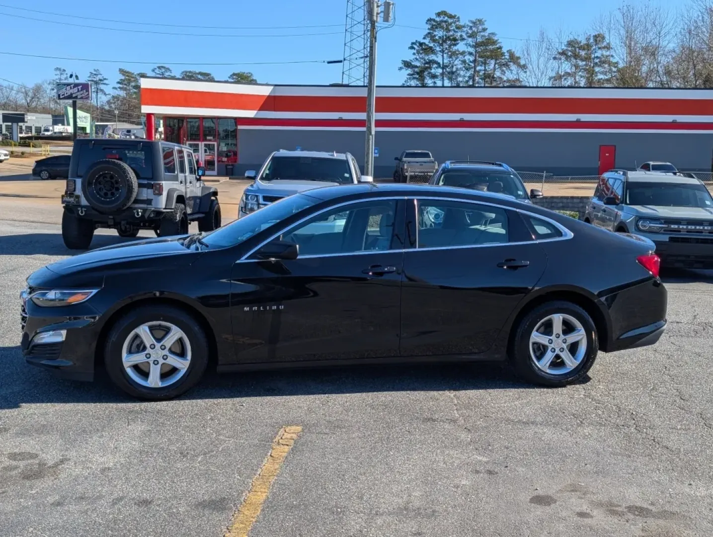 2022 /Dark Atmosphere/ Medium Ash Gray Chevrolet Malibu LS (1G1ZC5ST7NF) with an Other engine, located at 3959 U.S. 80 W, Phenix City, AL, 36870, (334) 297-4885, 32.469296, -85.135185 - **Discover the Perfect Balance of Style and Comfort with the 2022 Chevrolet Malibu at Gils Auto - Phenix City**<br /> <br /> Are you looking for a reliable sedan that effortlessly combines modern technology, spacious comfort, and fuel efficiency? Whether you're commuting to work, shuttling the kids - Photo#7