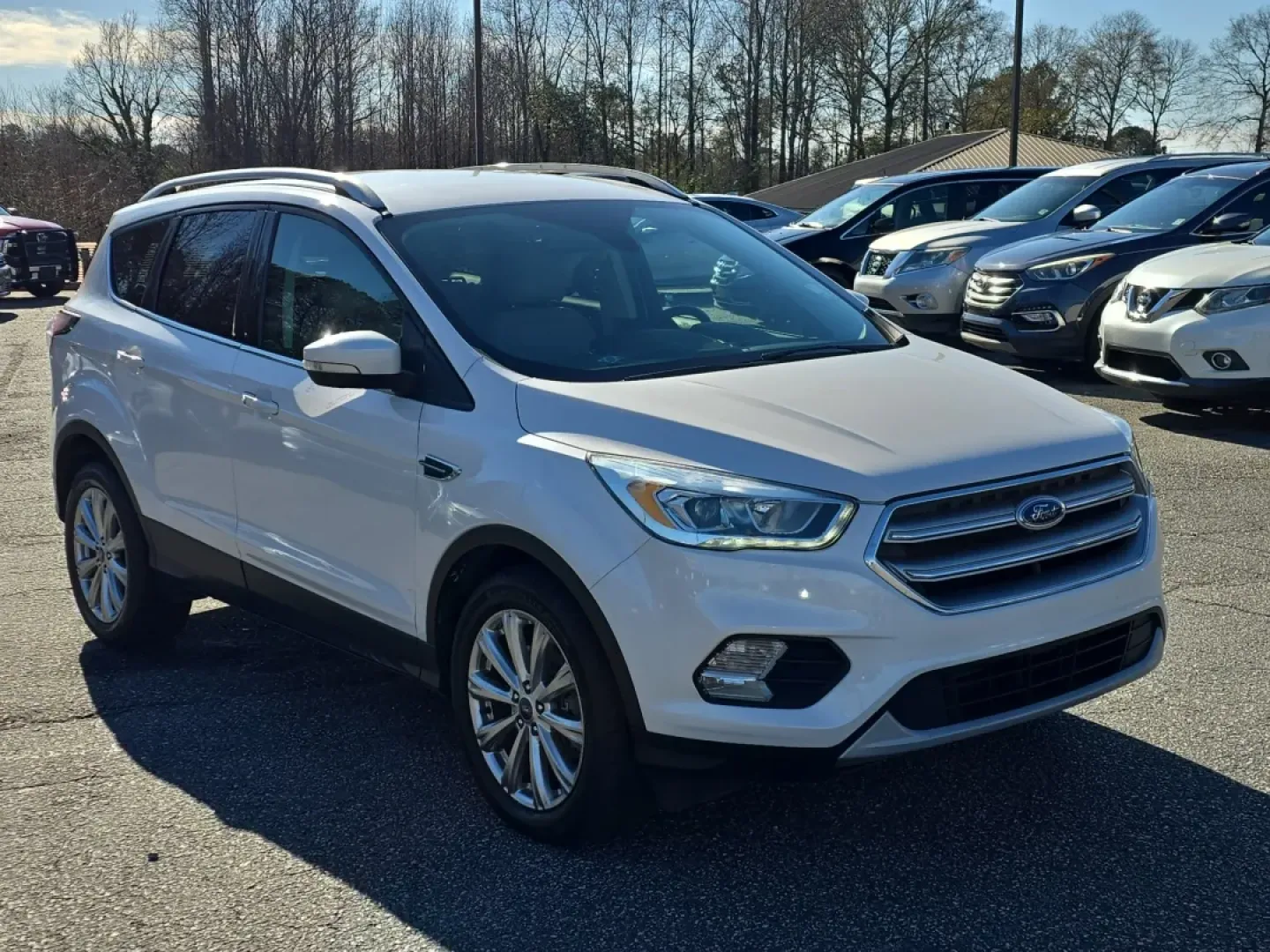 2017 /Medium Light Stone Ford Escape Titanium (1FMCU9J9XHU) with an Other engine, located at 3959 U.S. 80 W, Phenix City, AL, 36870, (334) 297-4885, 32.469296, -85.135185 - **Discover Adventure and Comfort with the 2017 Ford Escape Titanium at Gils Auto - Phenix City!**<br /> <br /> Are you ready to elevate your daily commute, family road trips, or weekend adventures? The 2017 Ford Escape Titanium is your ticket to a lifestyle full of exploration and comfort. Perfectly - Photo#2