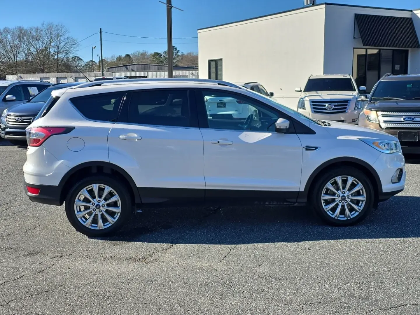 2017 /Medium Light Stone Ford Escape Titanium (1FMCU9J9XHU) with an Other engine, located at 3959 U.S. 80 W, Phenix City, AL, 36870, (334) 297-4885, 32.469296, -85.135185 - **Discover Adventure and Comfort with the 2017 Ford Escape Titanium at Gils Auto - Phenix City!**<br /> <br /> Are you ready to elevate your daily commute, family road trips, or weekend adventures? The 2017 Ford Escape Titanium is your ticket to a lifestyle full of exploration and comfort. Perfectly - Photo#3