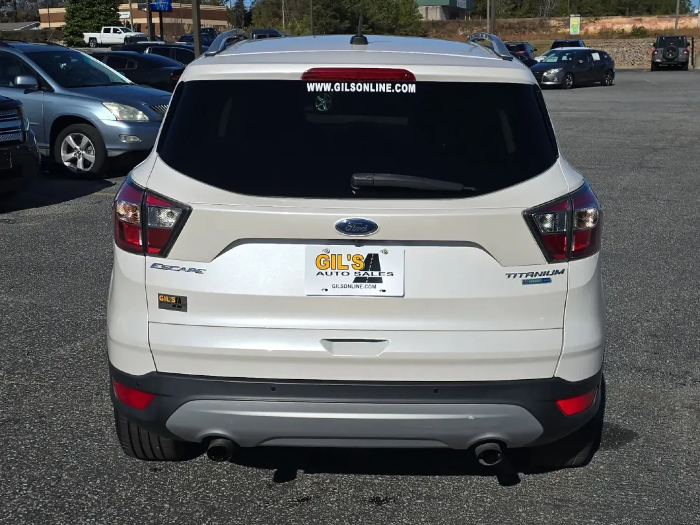 2017 /Medium Light Stone Ford Escape Titanium (1FMCU9J9XHU) with an Other engine, located at 3959 U.S. 80 W, Phenix City, AL, 36870, (334) 297-4885, 32.469296, -85.135185 - **Discover Adventure and Comfort with the 2017 Ford Escape Titanium at Gils Auto - Phenix City!**<br /> <br /> Are you ready to elevate your daily commute, family road trips, or weekend adventures? The 2017 Ford Escape Titanium is your ticket to a lifestyle full of exploration and comfort. Perfectly - Photo#5
