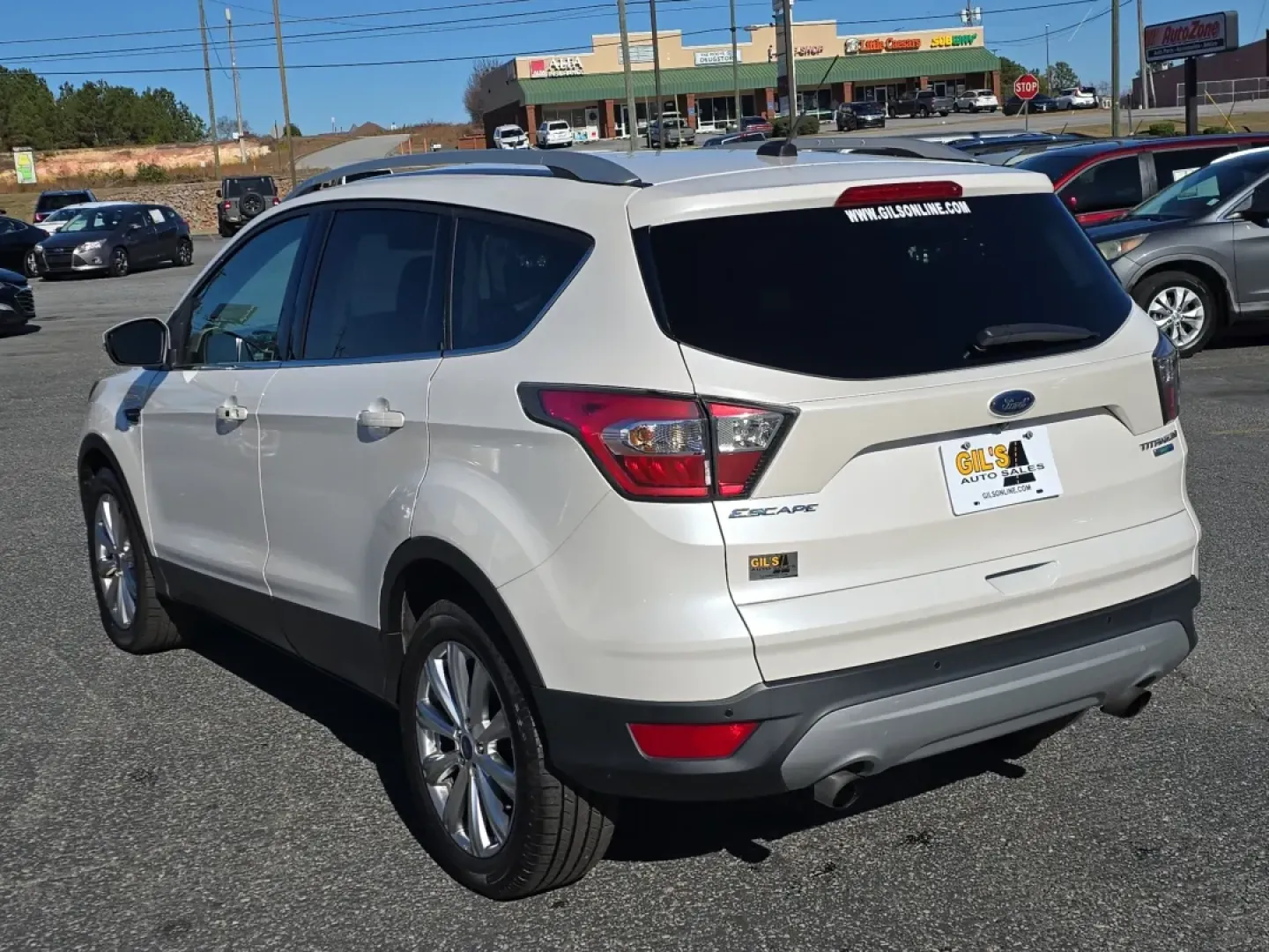 2017 /Medium Light Stone Ford Escape Titanium (1FMCU9J9XHU) with an Other engine, located at 3959 U.S. 80 W, Phenix City, AL, 36870, (334) 297-4885, 32.469296, -85.135185 - **Discover Adventure and Comfort with the 2017 Ford Escape Titanium at Gils Auto - Phenix City!**<br /> <br /> Are you ready to elevate your daily commute, family road trips, or weekend adventures? The 2017 Ford Escape Titanium is your ticket to a lifestyle full of exploration and comfort. Perfectly - Photo#6