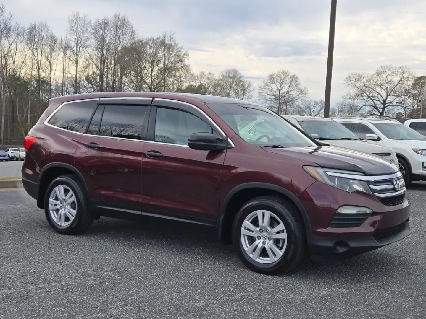 2016 Honda Pilot LX (5FNYF5H10GB) with an Other engine, located at 3959 U.S. 80 W, Phenix City, AL, 36870, (334) 297-4885, 32.469296, -85.135185 - **Adventure Awaits with the 2016 Honda Pilot LX: Your Perfect Family SUV!**<br /> <br /> Are you seeking a versatile and spacious vehicle that perfectly accommodates your growing family or weekend adventures? Look no further than the 2016 Honda Pilot LX, now available at Gils Auto in Phenix City, AL - Photo#3