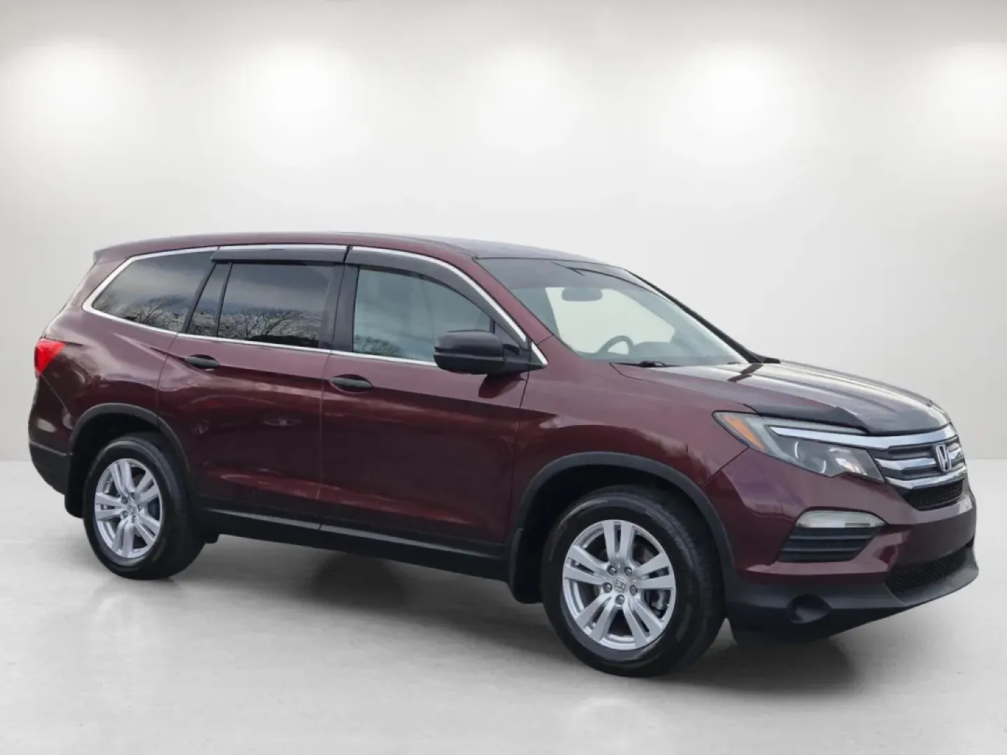 2016 Honda Pilot LX (5FNYF5H10GB) with an Other engine, located at 1430 Gateway Drive, Opelika, AL, 36801, (334) 239-0944, 32.637871, -85.409790 - **Adventure Awaits with the 2016 Honda Pilot LX: Your Perfect Family SUV!**<br /> <br /> Are you seeking a versatile and spacious vehicle that perfectly accommodates your growing family or weekend adventures? Look no further than the 2016 Honda Pilot LX, now available at Gils Auto in Phenix City, AL - Photo#3