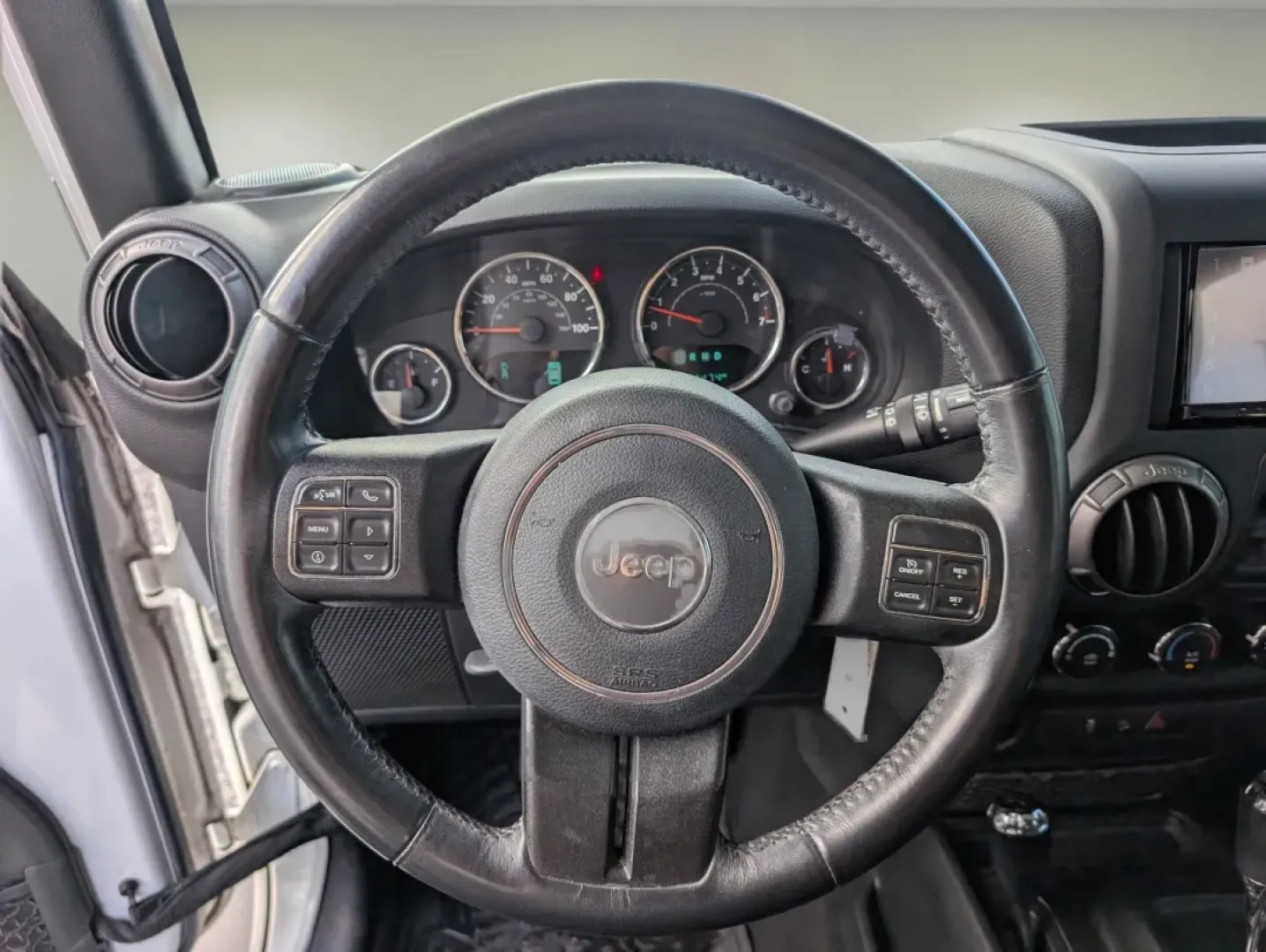 2018 /Black Jeep Wrangler Sport S (1C4BJWDG1JL) with an Other engine, located at 1430 Gateway Drive, Opelika, AL, 36801, (334) 239-0944, 32.637871, -85.409790 - **Adventure Awaits with This 2018 Jeep Wrangler Sport S in Phenix City, AL!**<br /> <br /> Are you ready to embark on thrilling adventures or conquer your daily commute with style? Look no further than this 2018 Jeep Wrangler Sport S, a versatile SUV designed for both rugged terrains and urban lands - Photo#15