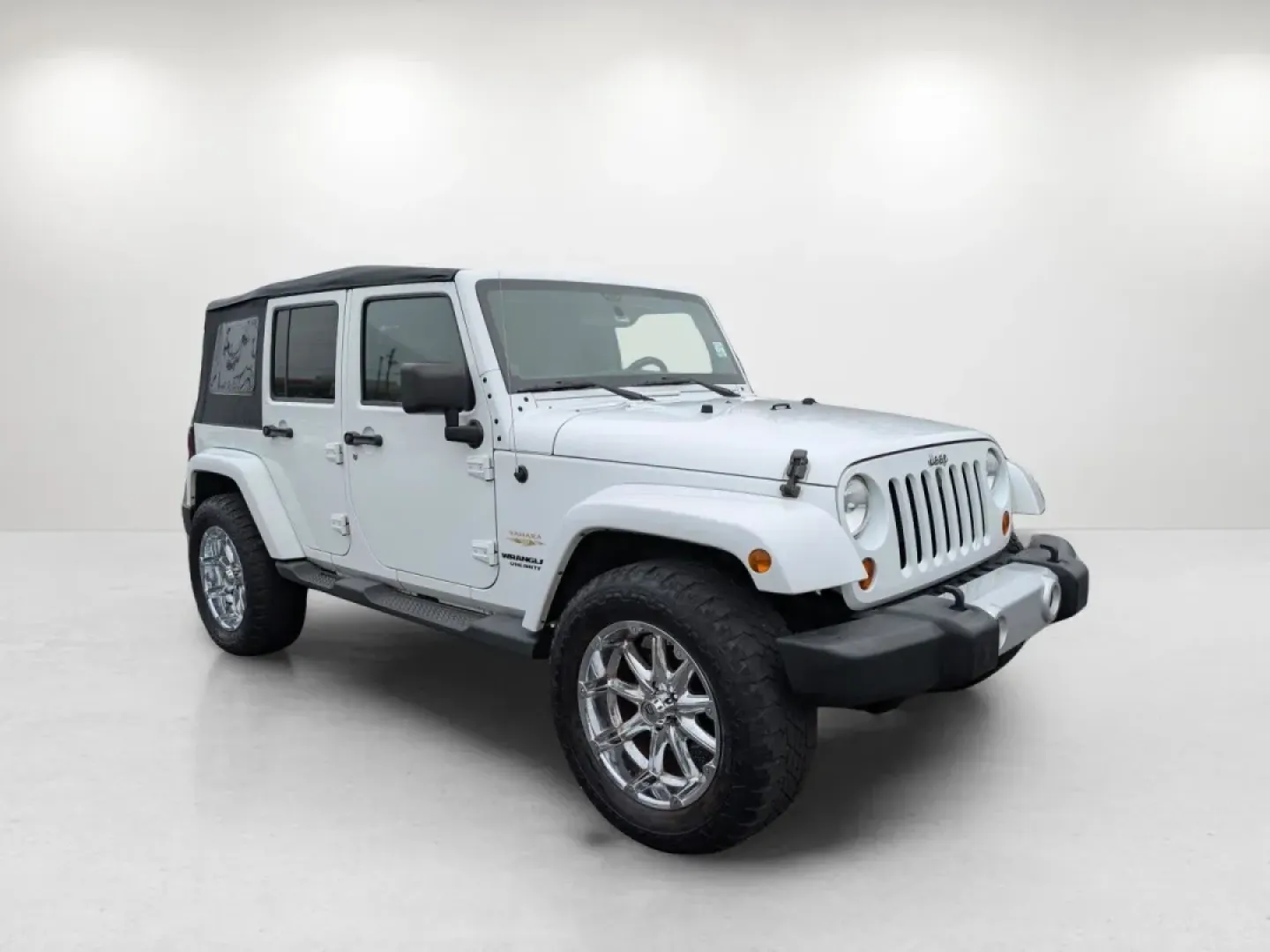 2012 /Black/Dark Saddle Interior Jeep Wrangler Sahara (1C4BJWEG5CL) with an Other engine, located at 3959 U.S. 80 W, Phenix City, AL, 36870, (334) 297-4885, 32.469296, -85.135185 - **Unleash Your Adventurous Spirit with the 2012 Jeep Wrangler Sahara!**<br /> <br /> Are you ready for your next big adventure? Whether you're navigating rugged trails, cruising through the scenic roads of Phenix City, or simply enjoying the freedom that comes with driving a convertible SUV, the 201 - Photo#2