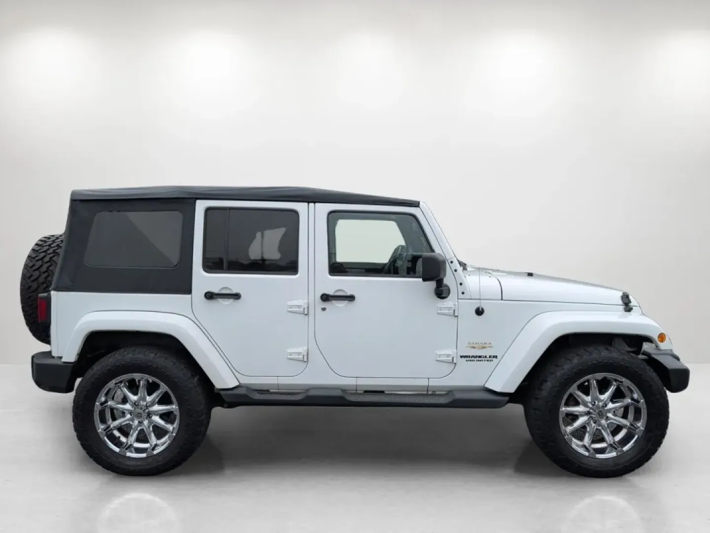 2012 /Black/Dark Saddle Interior Jeep Wrangler Sahara (1C4BJWEG5CL) with an Other engine, located at 3959 U.S. 80 W, Phenix City, AL, 36870, (334) 297-4885, 32.469296, -85.135185 - **Unleash Your Adventurous Spirit with the 2012 Jeep Wrangler Sahara!**<br /> <br /> Are you ready for your next big adventure? Whether you're navigating rugged trails, cruising through the scenic roads of Phenix City, or simply enjoying the freedom that comes with driving a convertible SUV, the 201 - Photo#3