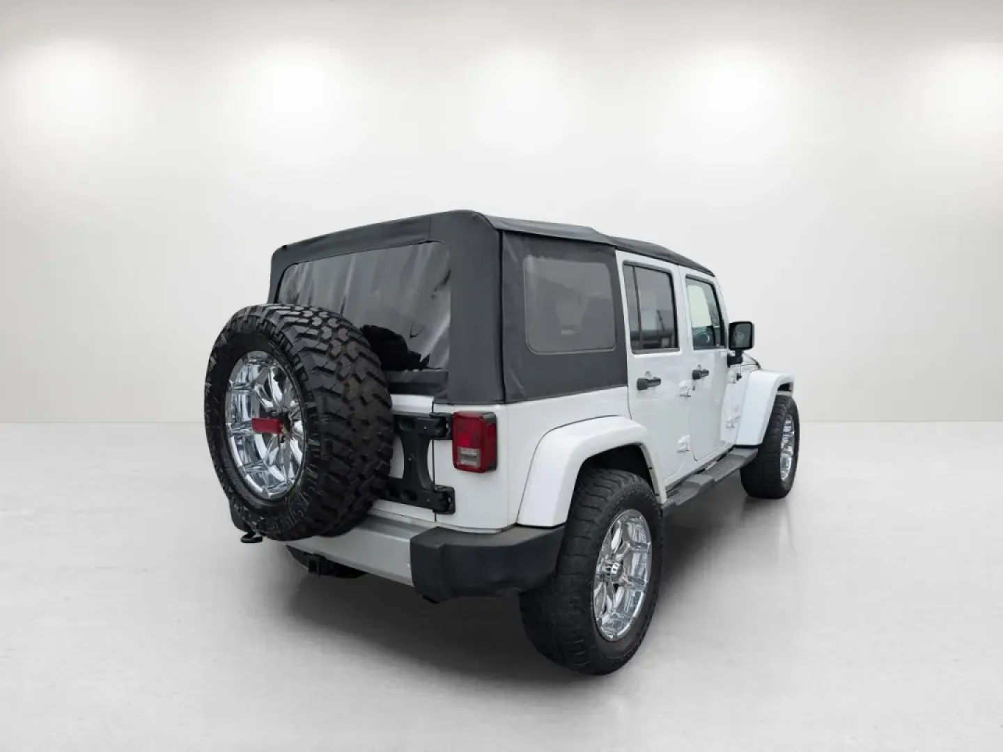 2012 /Black/Dark Saddle Interior Jeep Wrangler Sahara (1C4BJWEG5CL) with an Other engine, located at 3959 U.S. 80 W, Phenix City, AL, 36870, (334) 297-4885, 32.469296, -85.135185 - **Unleash Your Adventurous Spirit with the 2012 Jeep Wrangler Sahara!**<br /> <br /> Are you ready for your next big adventure? Whether you're navigating rugged trails, cruising through the scenic roads of Phenix City, or simply enjoying the freedom that comes with driving a convertible SUV, the 201 - Photo#4