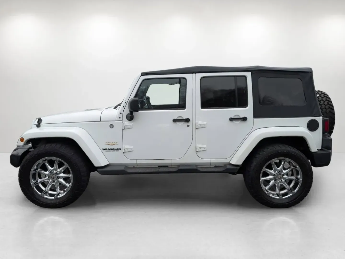 2012 /Black/Dark Saddle Interior Jeep Wrangler Sahara (1C4BJWEG5CL) with an Other engine, located at 3959 U.S. 80 W, Phenix City, AL, 36870, (334) 297-4885, 32.469296, -85.135185 - **Unleash Your Adventurous Spirit with the 2012 Jeep Wrangler Sahara!**<br /> <br /> Are you ready for your next big adventure? Whether you're navigating rugged trails, cruising through the scenic roads of Phenix City, or simply enjoying the freedom that comes with driving a convertible SUV, the 201 - Photo#7