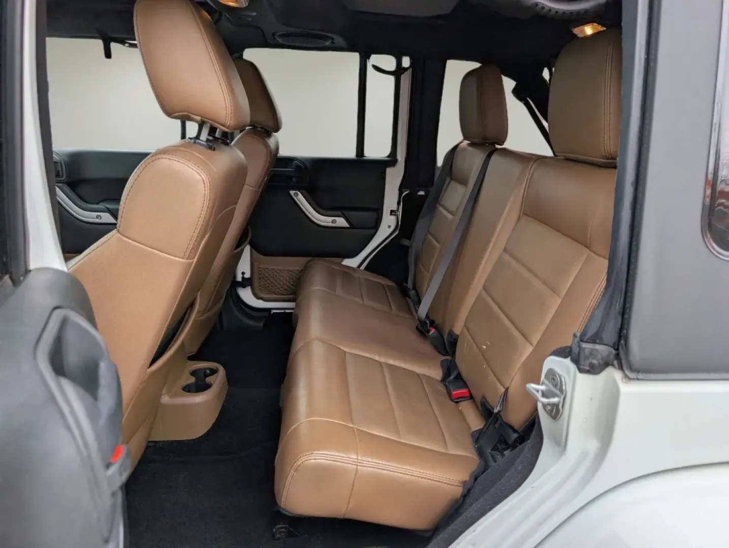 2012 /Black/Dark Saddle Interior Jeep Wrangler Sahara (1C4BJWEG5CL) with an Other engine, located at 3959 U.S. 80 W, Phenix City, AL, 36870, (334) 297-4885, 32.469296, -85.135185 - **Unleash Your Adventurous Spirit with the 2012 Jeep Wrangler Sahara!**<br /> <br /> Are you ready for your next big adventure? Whether you're navigating rugged trails, cruising through the scenic roads of Phenix City, or simply enjoying the freedom that comes with driving a convertible SUV, the 201 - Photo#10