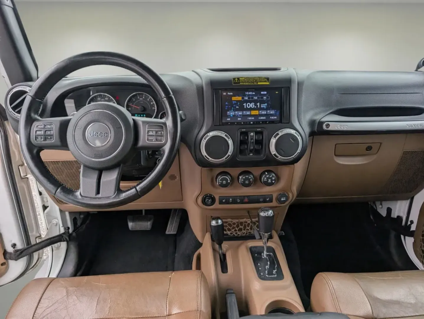 2012 /Black/Dark Saddle Interior Jeep Wrangler Sahara (1C4BJWEG5CL) with an Other engine, located at 3959 U.S. 80 W, Phenix City, AL, 36870, (334) 297-4885, 32.469296, -85.135185 - **Unleash Your Adventurous Spirit with the 2012 Jeep Wrangler Sahara!**<br /> <br /> Are you ready for your next big adventure? Whether you're navigating rugged trails, cruising through the scenic roads of Phenix City, or simply enjoying the freedom that comes with driving a convertible SUV, the 201 - Photo#11