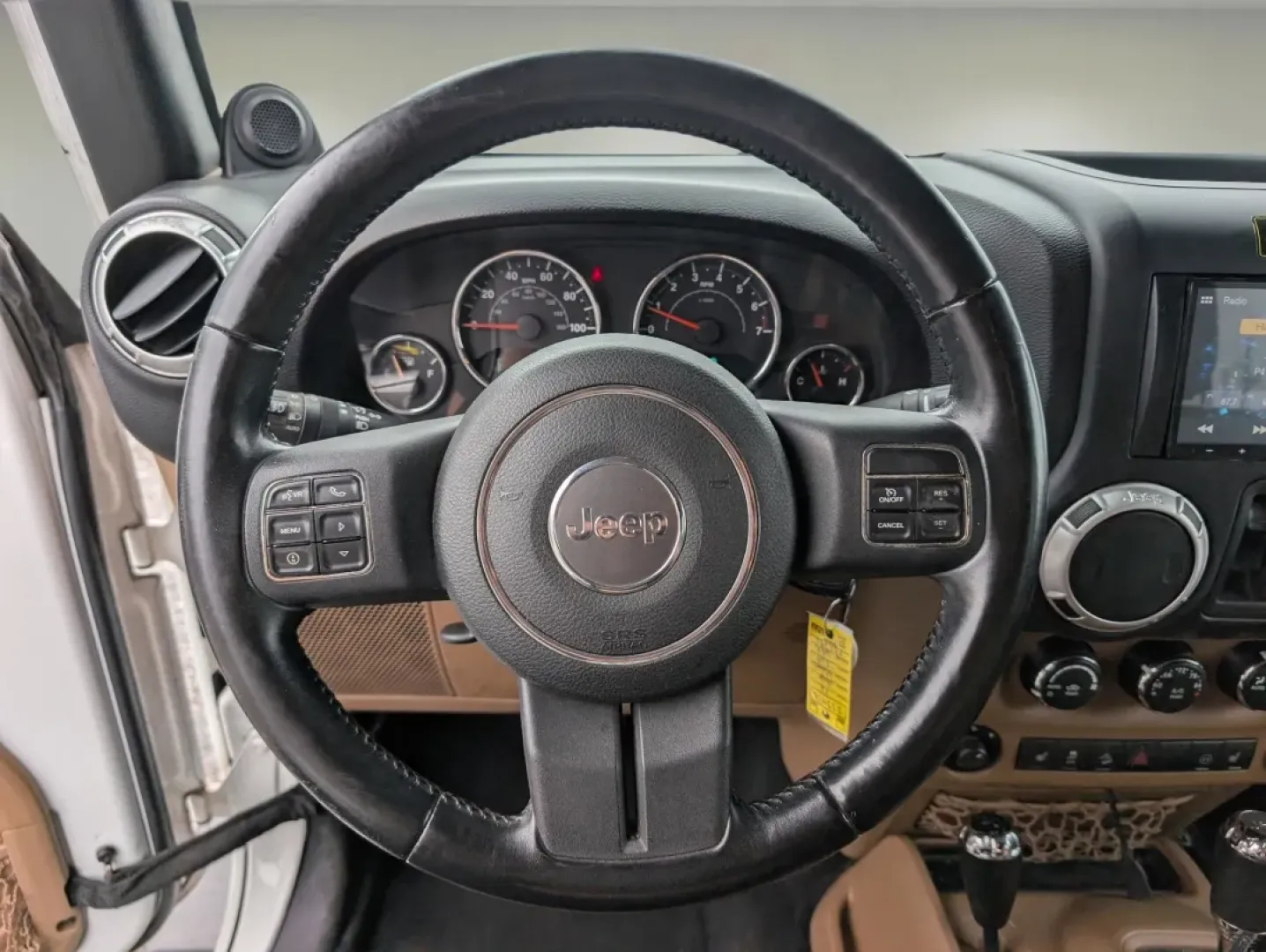 2012 /Black/Dark Saddle Interior Jeep Wrangler Sahara (1C4BJWEG5CL) with an Other engine, located at 3959 U.S. 80 W, Phenix City, AL, 36870, (334) 297-4885, 32.469296, -85.135185 - **Unleash Your Adventurous Spirit with the 2012 Jeep Wrangler Sahara!**<br /> <br /> Are you ready for your next big adventure? Whether you're navigating rugged trails, cruising through the scenic roads of Phenix City, or simply enjoying the freedom that comes with driving a convertible SUV, the 201 - Photo#15