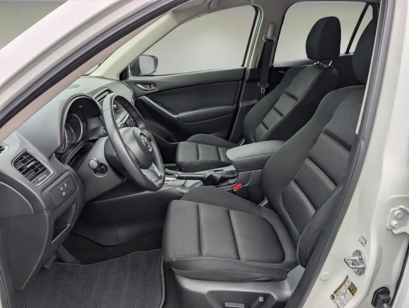 2015 /Black Mazda CX-5 Touring (JM3KE2CY2F0) with an Other engine, located at 7000 Northlake Connector, Columbus, GA, 31904, (706) 987-8085, 32.524975, -84.978134 - **Experience the Thrill of Adventure with the 2015 Mazda CX-5 Touring at Gils Auto in Phenix City, AL!**<br /> <br /> Are you seeking the perfect vehicle for your family's adventures, daily commutes, or weekend getaways? Look no further than the stunning 2015 Mazda CX-5 Touring, now available at Gil - Photo#9