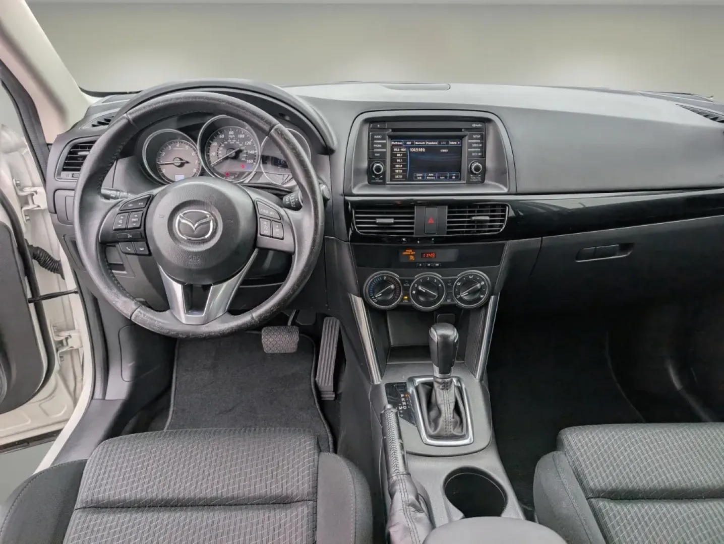 2015 /Black Mazda CX-5 Touring (JM3KE2CY2F0) with an Other engine, located at 7000 Northlake Connector, Columbus, GA, 31904, (706) 987-8085, 32.524975, -84.978134 - **Experience the Thrill of Adventure with the 2015 Mazda CX-5 Touring at Gils Auto in Phenix City, AL!**<br /> <br /> Are you seeking the perfect vehicle for your family's adventures, daily commutes, or weekend getaways? Look no further than the stunning 2015 Mazda CX-5 Touring, now available at Gil - Photo#11