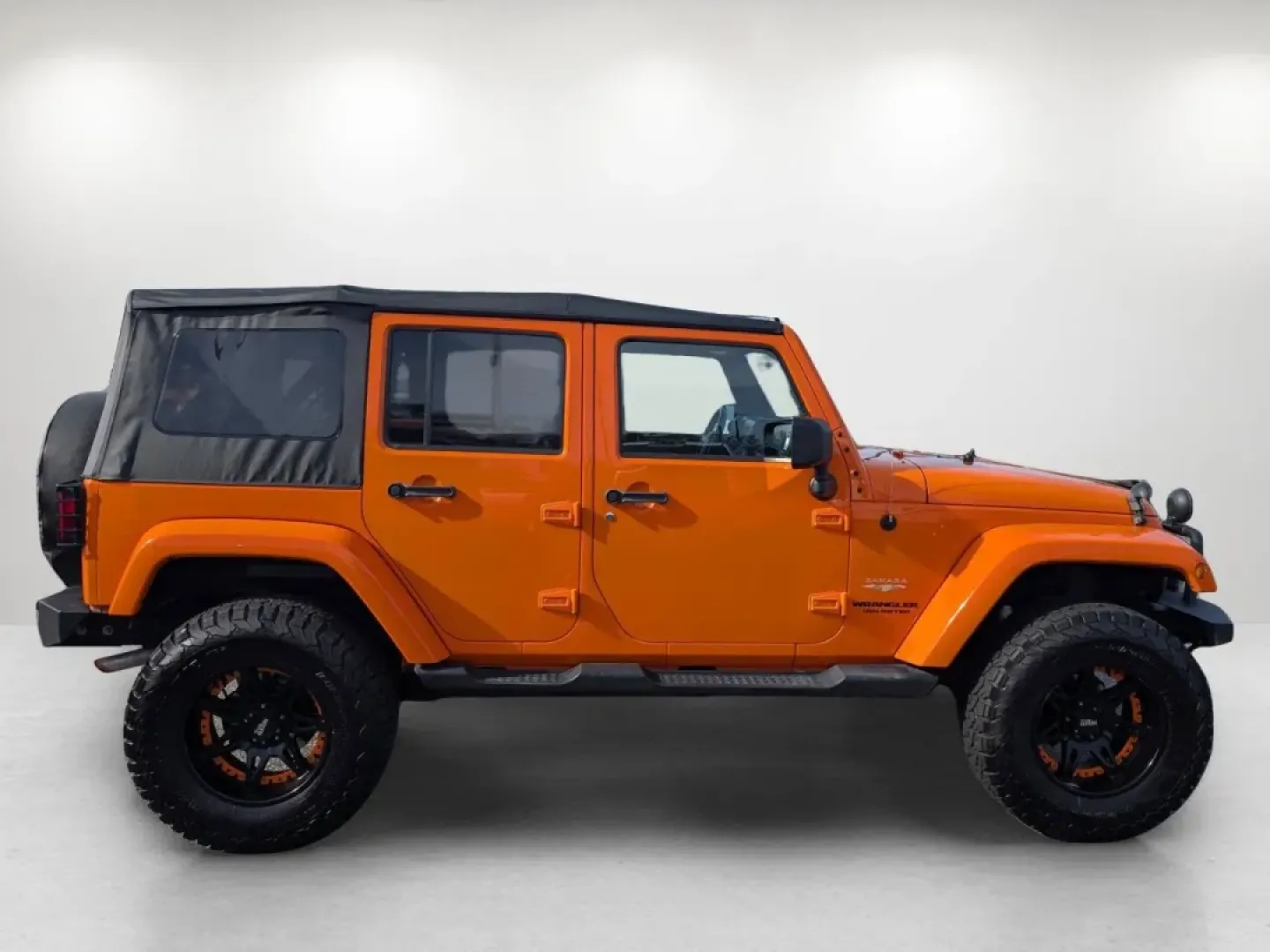 2013 /Black Interior Jeep Wrangler Sahara (1C4BJWEG5DL) with an Other engine, located at 7000 Northlake Connector, Columbus, GA, 31904, (706) 987-8085, 32.524975, -84.978134 - **Explore the Great Outdoors in Your Dream 2013 Jeep Wrangler Sahara!** <br /> <br /> Are you ready to embark on unforgettable weekend adventures or navigate your daily commute with style and confidence? Look no further than this stunning 2013 Jeep Wrangler Sahara, available now at Gils Auto in Phen - Photo#3