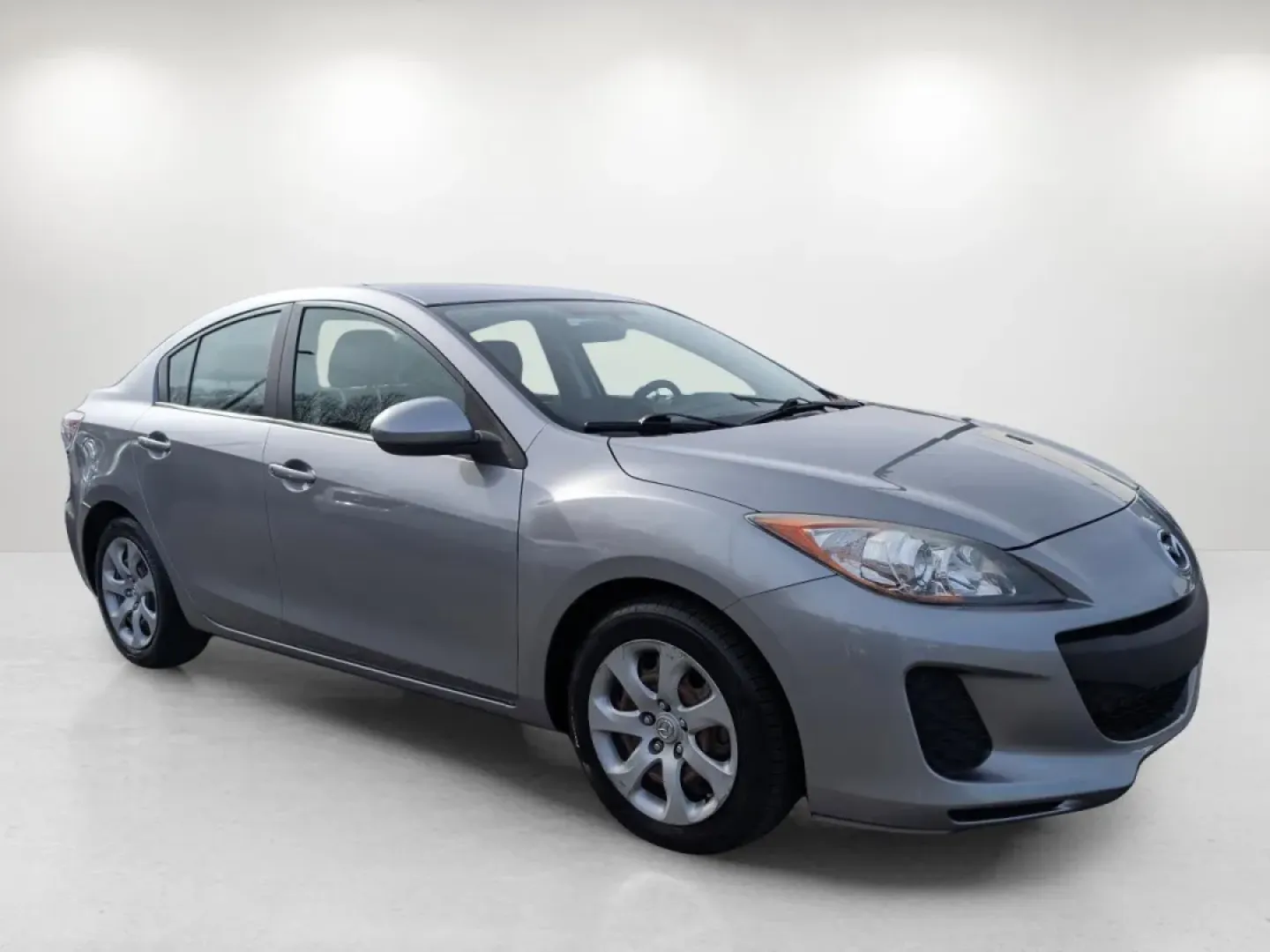 2012 /Black Mazda Mazda3 i Sport (JM1BL1UF7C1) with an Other engine, located at 1430 Gateway Drive, Opelika, AL, 36801, (334) 239-0944, 32.637871, -85.409790 - Are you searching for a reliable and stylish sedan that perfectly balances functionality and comfort? Look no further! At Gils Auto in Phenix City, AL, we have just the vehicle for you: a sleek 2012 Mazda3 i Sport. This sedan is not only great for daily commutes and weekend getaways, but it's also a - Photo#2