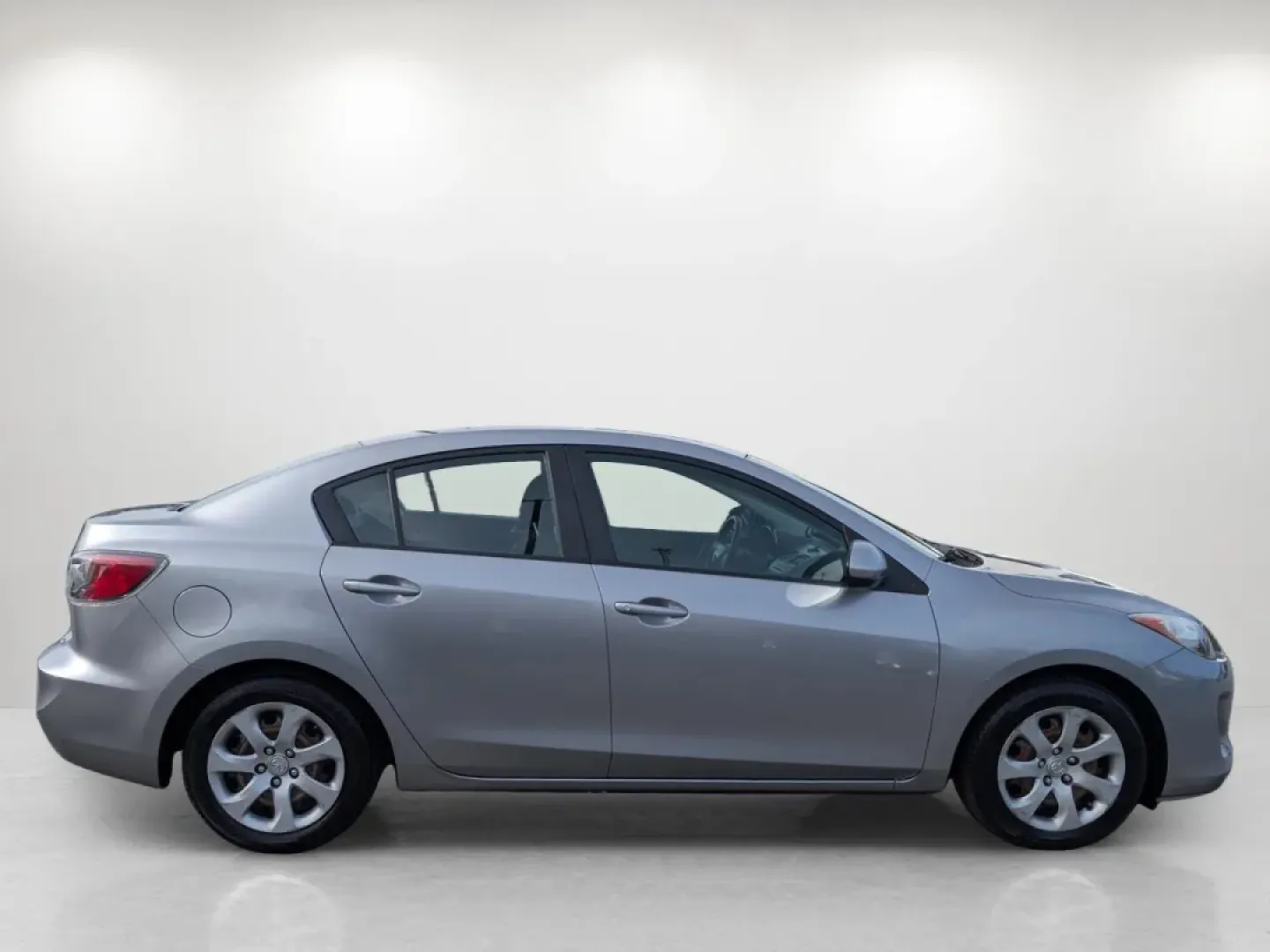 2012 /Black Mazda Mazda3 i Sport (JM1BL1UF7C1) with an Other engine, located at 1430 Gateway Drive, Opelika, AL, 36801, (334) 239-0944, 32.637871, -85.409790 - Are you searching for a reliable and stylish sedan that perfectly balances functionality and comfort? Look no further! At Gils Auto in Phenix City, AL, we have just the vehicle for you: a sleek 2012 Mazda3 i Sport. This sedan is not only great for daily commutes and weekend getaways, but it's also a - Photo#3