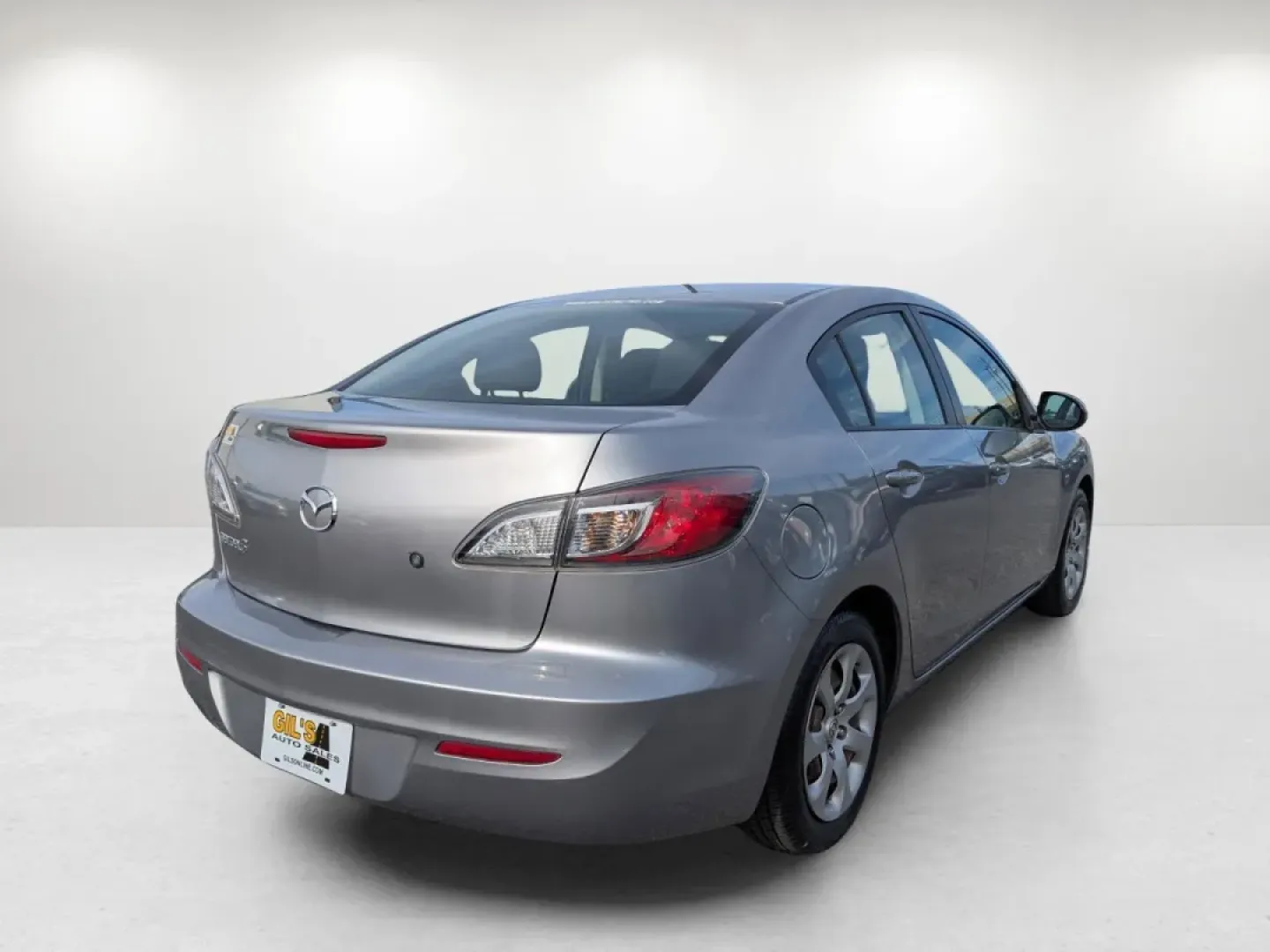 2012 /Black Mazda Mazda3 i Sport (JM1BL1UF7C1) with an Other engine, located at 1430 Gateway Drive, Opelika, AL, 36801, (334) 239-0944, 32.637871, -85.409790 - Are you searching for a reliable and stylish sedan that perfectly balances functionality and comfort? Look no further! At Gils Auto in Phenix City, AL, we have just the vehicle for you: a sleek 2012 Mazda3 i Sport. This sedan is not only great for daily commutes and weekend getaways, but it's also a - Photo#4