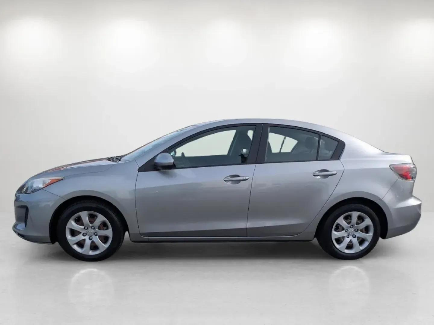 2012 /Black Mazda Mazda3 i Sport (JM1BL1UF7C1) with an Other engine, located at 1430 Gateway Drive, Opelika, AL, 36801, (334) 239-0944, 32.637871, -85.409790 - Are you searching for a reliable and stylish sedan that perfectly balances functionality and comfort? Look no further! At Gils Auto in Phenix City, AL, we have just the vehicle for you: a sleek 2012 Mazda3 i Sport. This sedan is not only great for daily commutes and weekend getaways, but it's also a - Photo#7