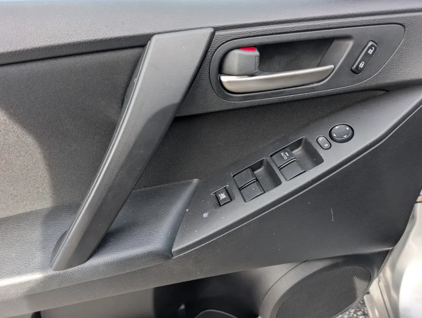 2012 /Black Mazda Mazda3 i Sport (JM1BL1UF7C1) with an Other engine, located at 1430 Gateway Drive, Opelika, AL, 36801, (334) 239-0944, 32.637871, -85.409790 - Are you searching for a reliable and stylish sedan that perfectly balances functionality and comfort? Look no further! At Gils Auto in Phenix City, AL, we have just the vehicle for you: a sleek 2012 Mazda3 i Sport. This sedan is not only great for daily commutes and weekend getaways, but it's also a - Photo#8