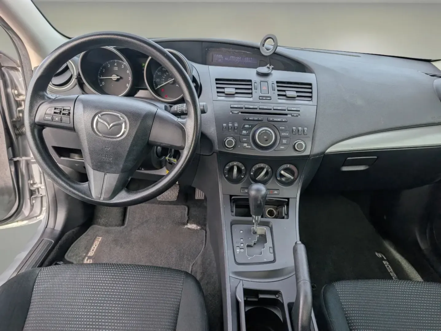 2012 /Black Mazda Mazda3 i Sport (JM1BL1UF7C1) with an Other engine, located at 1430 Gateway Drive, Opelika, AL, 36801, (334) 239-0944, 32.637871, -85.409790 - Are you searching for a reliable and stylish sedan that perfectly balances functionality and comfort? Look no further! At Gils Auto in Phenix City, AL, we have just the vehicle for you: a sleek 2012 Mazda3 i Sport. This sedan is not only great for daily commutes and weekend getaways, but it's also a - Photo#11