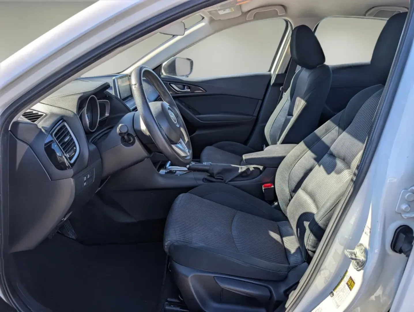 2016 /Black Mazda Mazda3 i Sport (JM1BM1U72G1) with an Other engine, located at 3959 U.S. 80 W, Phenix City, AL, 36870, (334) 297-4885, 32.469296, -85.135185 - **Discover Your Ideal Commuter Companion: 2016 Mazda3 at Gils Auto!**<br /> <br /> Are you searching for the perfect vehicle to elevate your daily commute and weekend adventures alike? Look no further than this stunning 2016 Mazda3 i Sport at Gils Auto in Phenix City, AL. This sedan combines style, - Photo#9