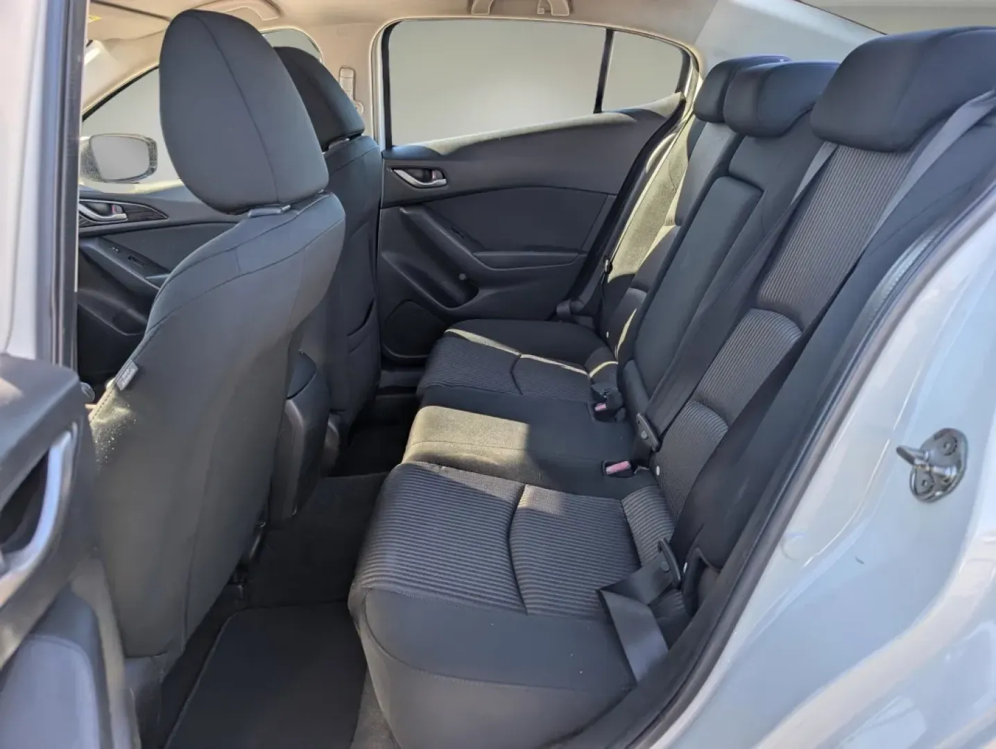 2016 /Black Mazda Mazda3 i Sport (JM1BM1U72G1) with an Other engine, located at 3959 U.S. 80 W, Phenix City, AL, 36870, (334) 297-4885, 32.469296, -85.135185 - **Discover Your Ideal Commuter Companion: 2016 Mazda3 at Gils Auto!**<br /> <br /> Are you searching for the perfect vehicle to elevate your daily commute and weekend adventures alike? Look no further than this stunning 2016 Mazda3 i Sport at Gils Auto in Phenix City, AL. This sedan combines style, - Photo#10