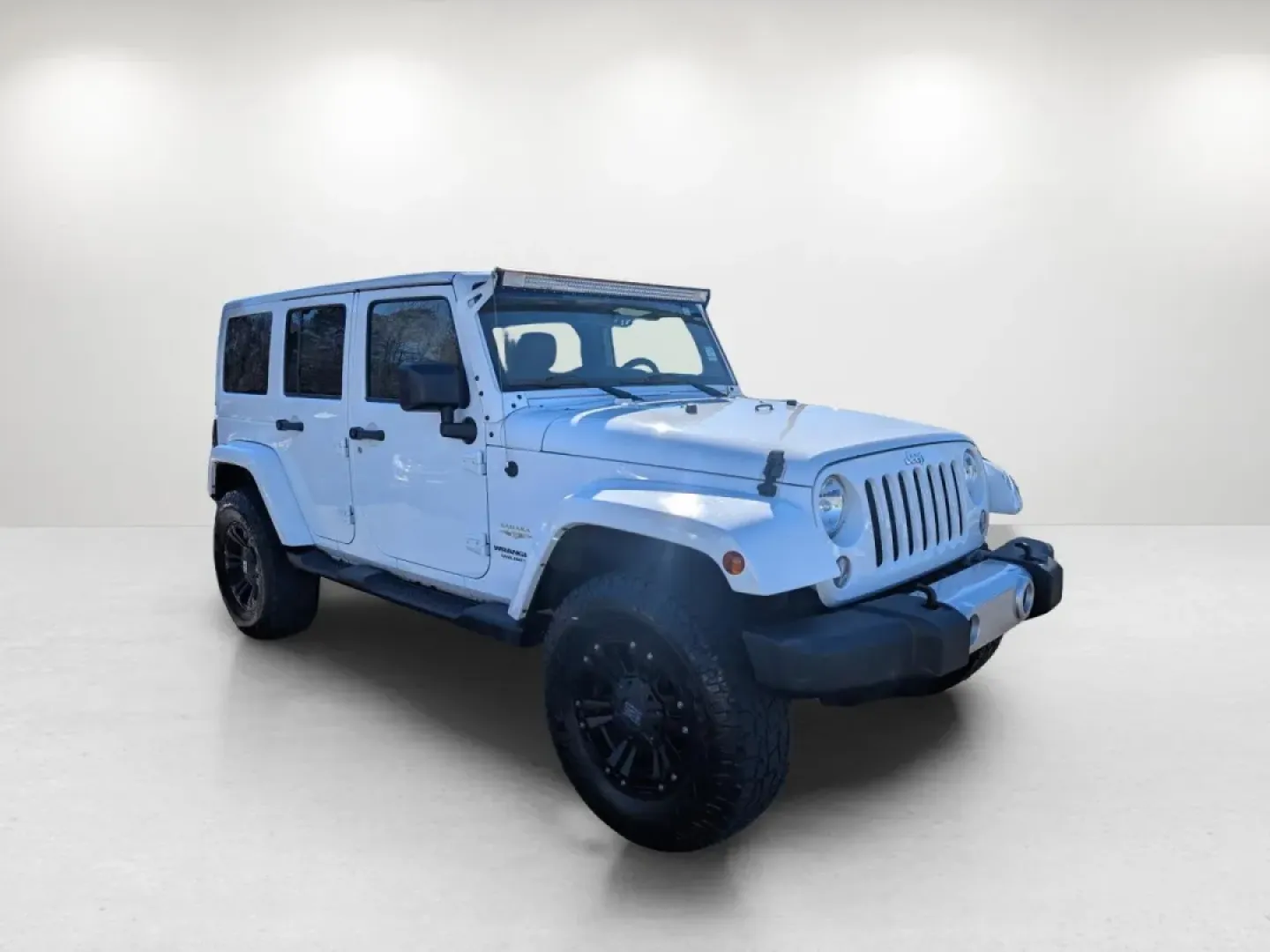 2015 /Dark Saddle/Black Jeep Wrangler Sahara (1C4BJWEGXFL) with an Other engine, located at 1430 Gateway Drive, Opelika, AL, 36801, (334) 239-0944, 32.637871, -85.409790 - **Unleash Adventure with the 2015 Jeep Wrangler Sahara - Your Ultimate Companion for Every Journey!**<br /> <br /> Looking for a vehicle that embodies freedom and adventure? Meet the 2015 Jeep Wrangler Sahara, a rugged SUV that's perfect for outdoor enthusiasts and urban explorers alike. Whether you - Photo#2