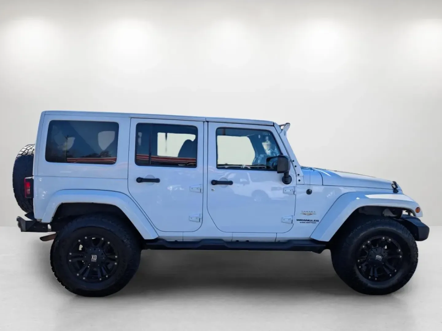 2015 /Dark Saddle/Black Jeep Wrangler Sahara (1C4BJWEGXFL) with an Other engine, located at 1430 Gateway Drive, Opelika, AL, 36801, (334) 239-0944, 32.637871, -85.409790 - **Unleash Adventure with the 2015 Jeep Wrangler Sahara - Your Ultimate Companion for Every Journey!**<br /> <br /> Looking for a vehicle that embodies freedom and adventure? Meet the 2015 Jeep Wrangler Sahara, a rugged SUV that's perfect for outdoor enthusiasts and urban explorers alike. Whether you - Photo#3