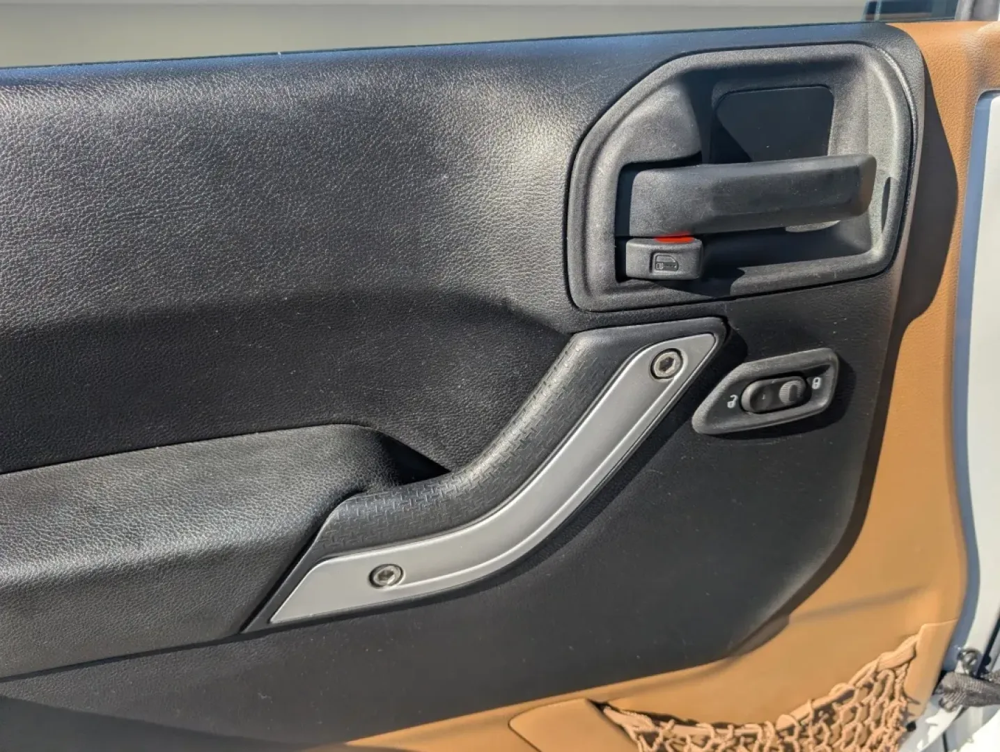 2015 /Dark Saddle/Black Jeep Wrangler Sahara (1C4BJWEGXFL) with an Other engine, located at 1430 Gateway Drive, Opelika, AL, 36801, (334) 239-0944, 32.637871, -85.409790 - **Unleash Adventure with the 2015 Jeep Wrangler Sahara - Your Ultimate Companion for Every Journey!**<br /> <br /> Looking for a vehicle that embodies freedom and adventure? Meet the 2015 Jeep Wrangler Sahara, a rugged SUV that's perfect for outdoor enthusiasts and urban explorers alike. Whether you - Photo#8