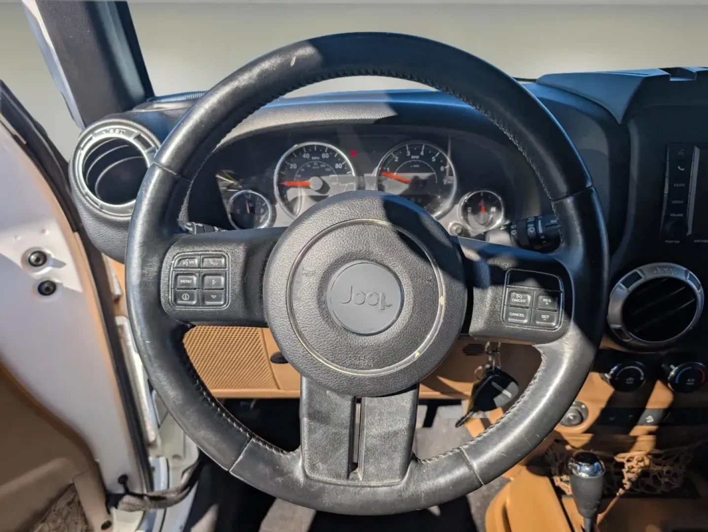 2015 /Dark Saddle/Black Jeep Wrangler Sahara (1C4BJWEGXFL) with an Other engine, located at 1430 Gateway Drive, Opelika, AL, 36801, (334) 239-0944, 32.637871, -85.409790 - **Unleash Adventure with the 2015 Jeep Wrangler Sahara - Your Ultimate Companion for Every Journey!**<br /> <br /> Looking for a vehicle that embodies freedom and adventure? Meet the 2015 Jeep Wrangler Sahara, a rugged SUV that's perfect for outdoor enthusiasts and urban explorers alike. Whether you - Photo#15