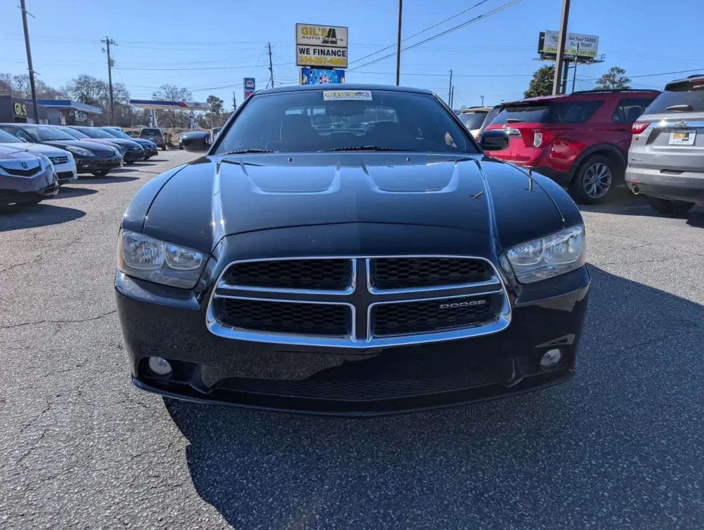 2012 /Black Interior Dodge Charger SXT (2C3CDXHG2CH) with an Other engine, located at 3959 U.S. 80 W, Phenix City, AL, 36870, (334) 297-4885, 32.469296, -85.135185 - **Experience the Thrill of the Open Road with the 2012 Dodge Charger SXT at Gils Auto - Prattville!**<br /> <br /> Are you on the lookout for a stylish, powerful vehicle that can keep up with your active lifestyle? The 2012 Dodge Charger SXT is perfect for those who appreciate a blend of performance - Photo#1