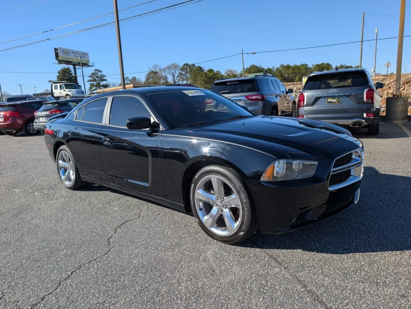 2012 /Black Interior Dodge Charger SXT (2C3CDXHG2CH) with an Other engine, located at 3959 U.S. 80 W, Phenix City, AL, 36870, (334) 297-4885, 32.469296, -85.135185 - **Experience the Thrill of the Open Road with the 2012 Dodge Charger SXT at Gils Auto - Prattville!**<br /> <br /> Are you on the lookout for a stylish, powerful vehicle that can keep up with your active lifestyle? The 2012 Dodge Charger SXT is perfect for those who appreciate a blend of performance - Photo#2