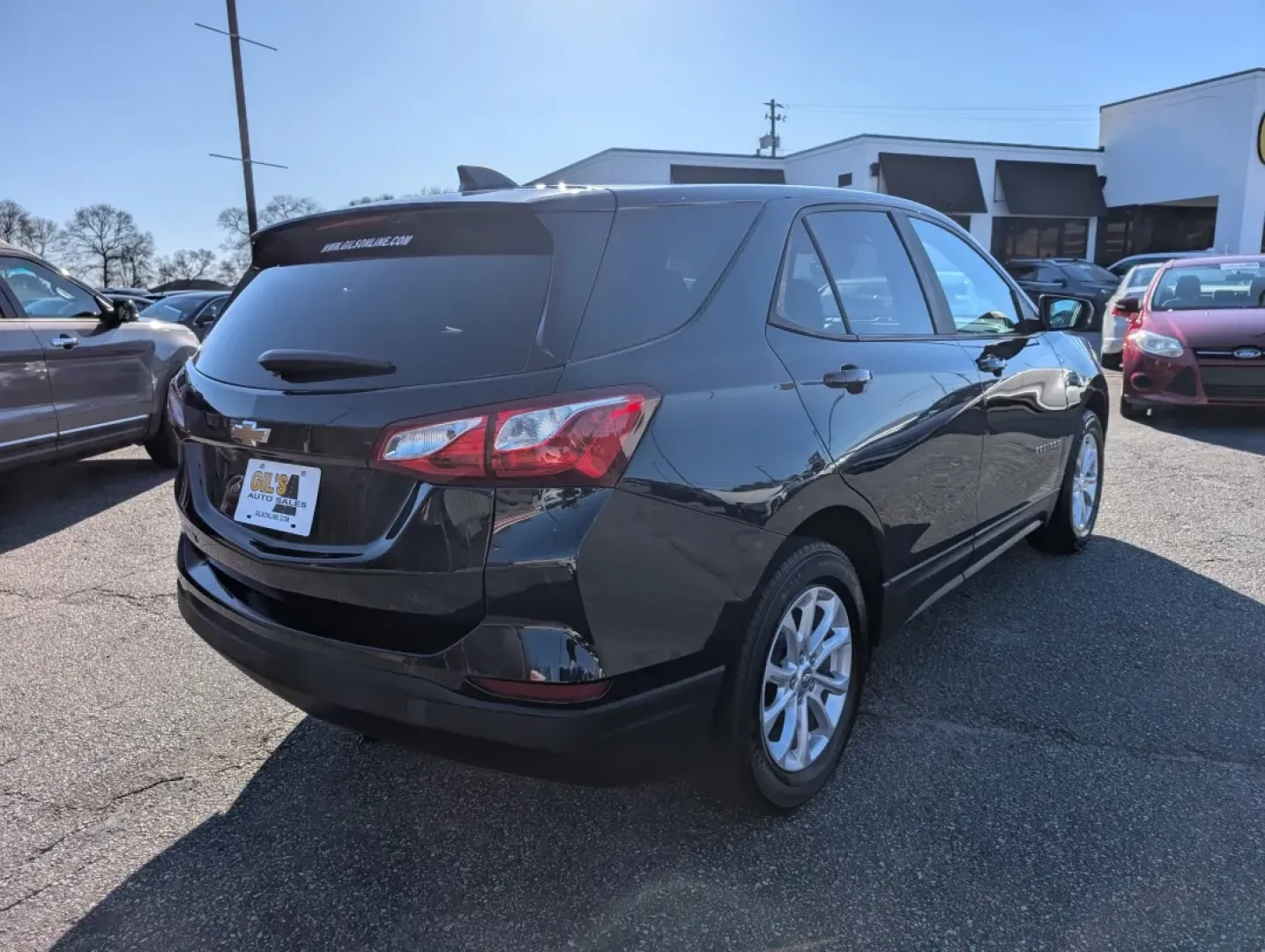 2021 /Medium Ash Gray Chevrolet Equinox LS (3GNAXHEV4MS) with an Other engine, located at 7000 Northlake Connector, Columbus, GA, 31904, (706) 987-8085, 32.524975, -84.978134 - **Explore New Adventures with the 2021 Chevrolet Equinox LS at Gils Auto Your Reliable Buy Here Pay Here Dealer in Phenix City, AL!**<br /> <br /> Are you a budget-conscious buyer searching for a versatile SUV that effortlessly fits into your active lifestyle? Look no further than the 2021 Chevrole - Photo#4