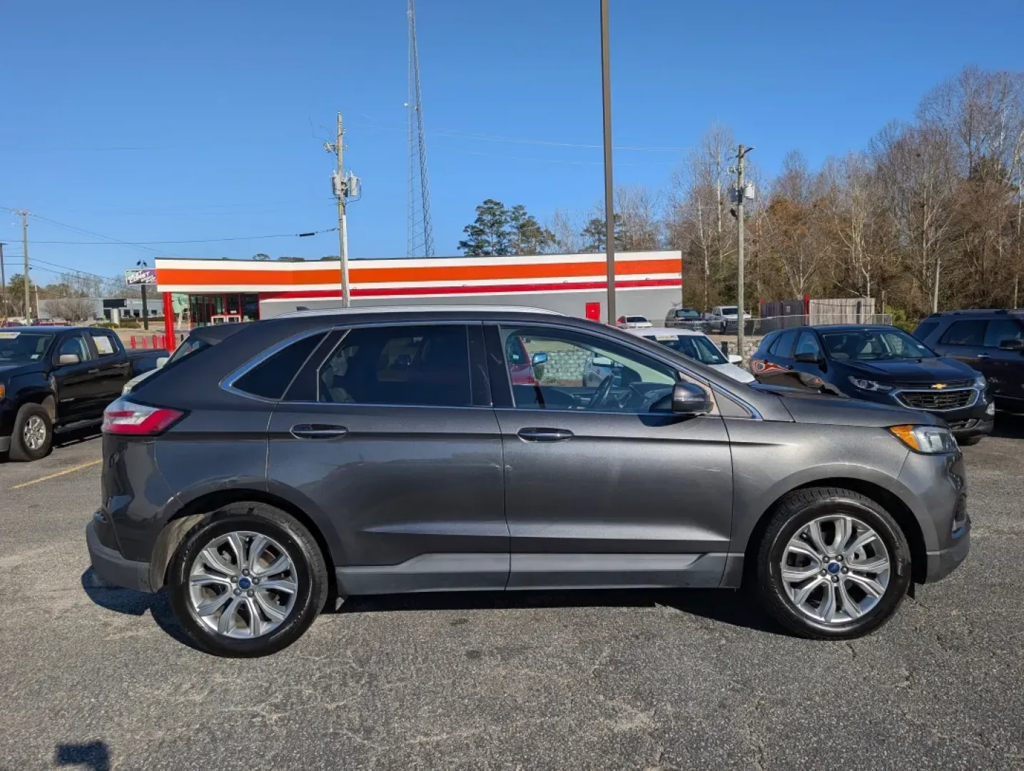 2019 Ford Edge Titanium (2FMPK3K9XKB) with an Other engine, located at 3959 U.S. 80 W, Phenix City, AL, 36870, (334) 297-4885, 32.469296, -85.135185 - **Conquer Life's Journeys with the 2019 Ford Edge Titanium SUV from Gils Auto in Phenix City!**<br /> <br /> Are you ready to elevate your daily drive? Whether you're commuting to work, taking the kids to soccer practice, or planning your next family road trip, the 2019 Ford Edge Titanium is the ver - Photo#3